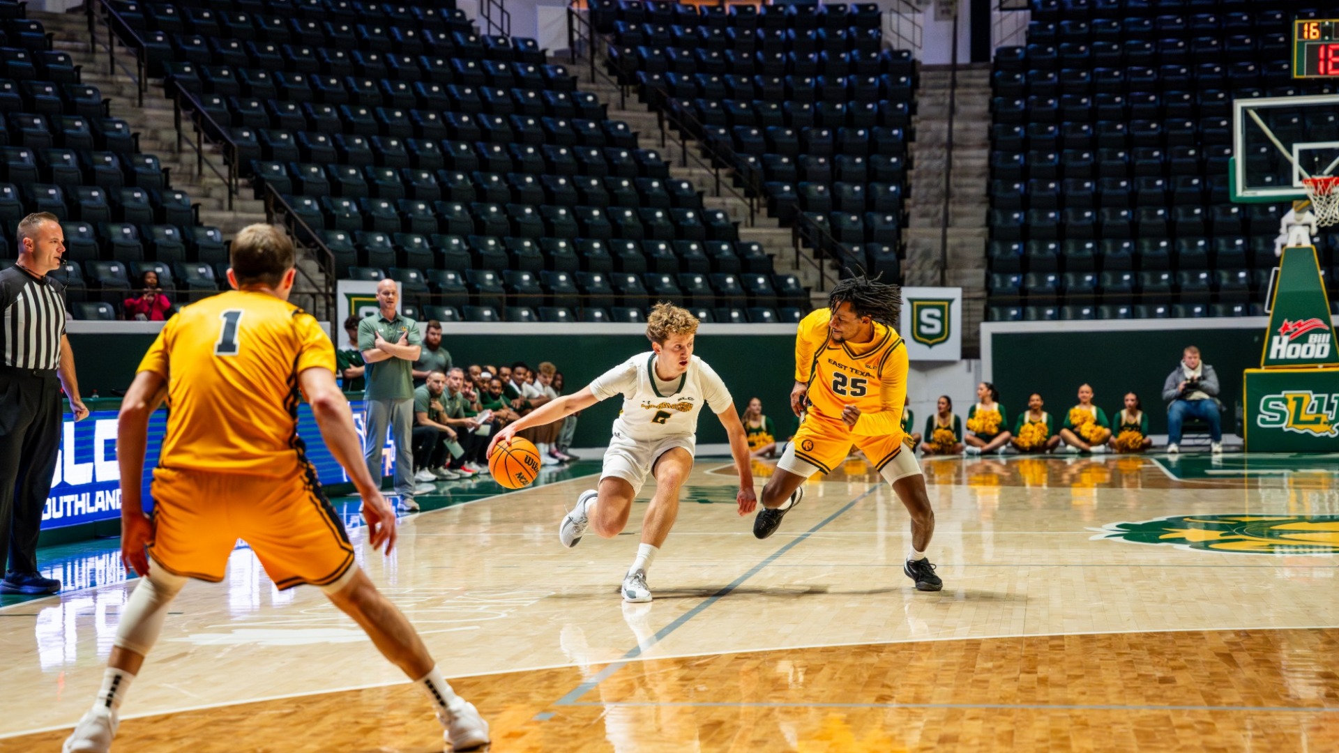Peter Hemschemeier driving around the wing against East Texas A&M defender 