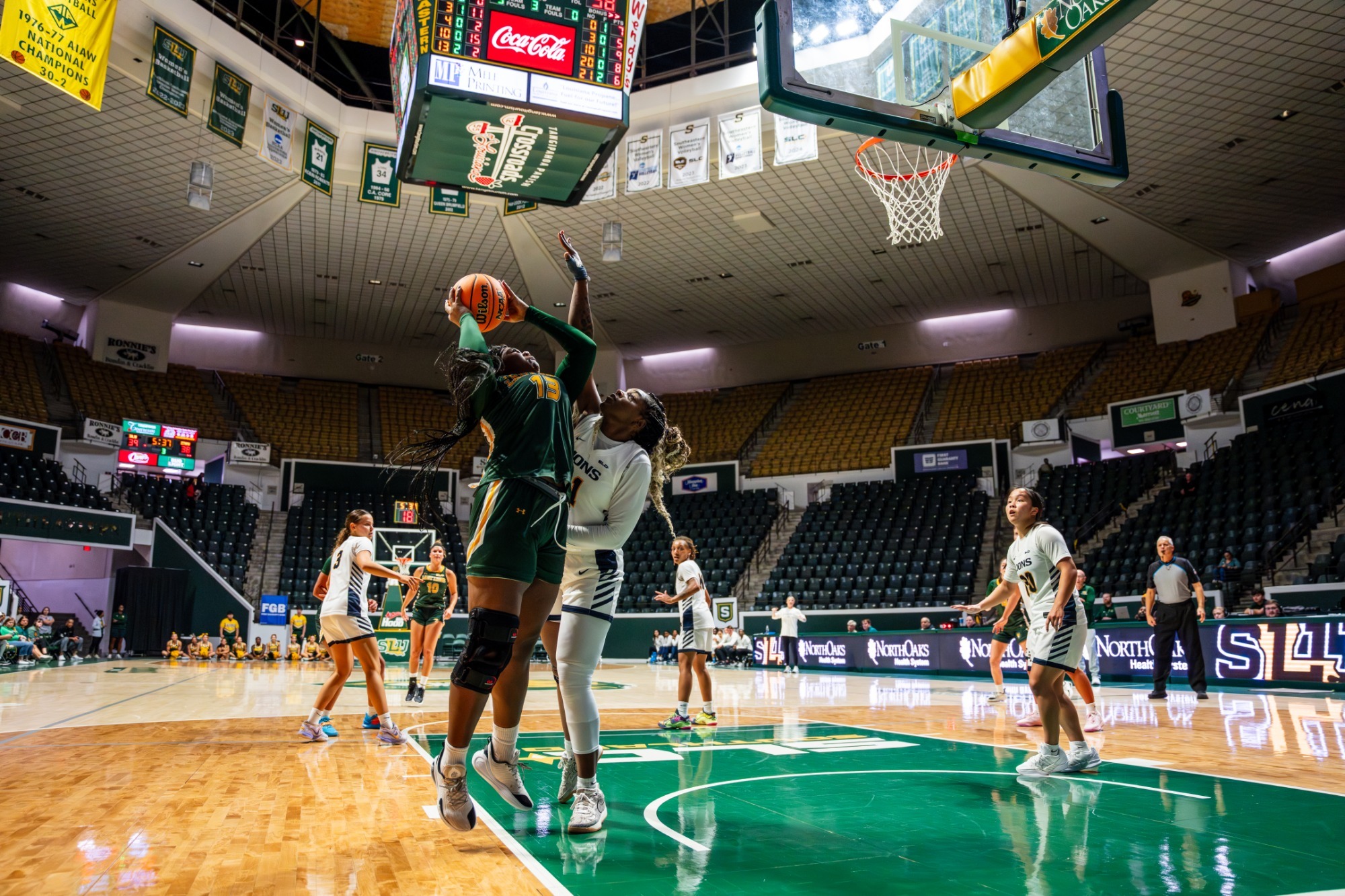 Bethany Graves shoots through contact Nov. 22