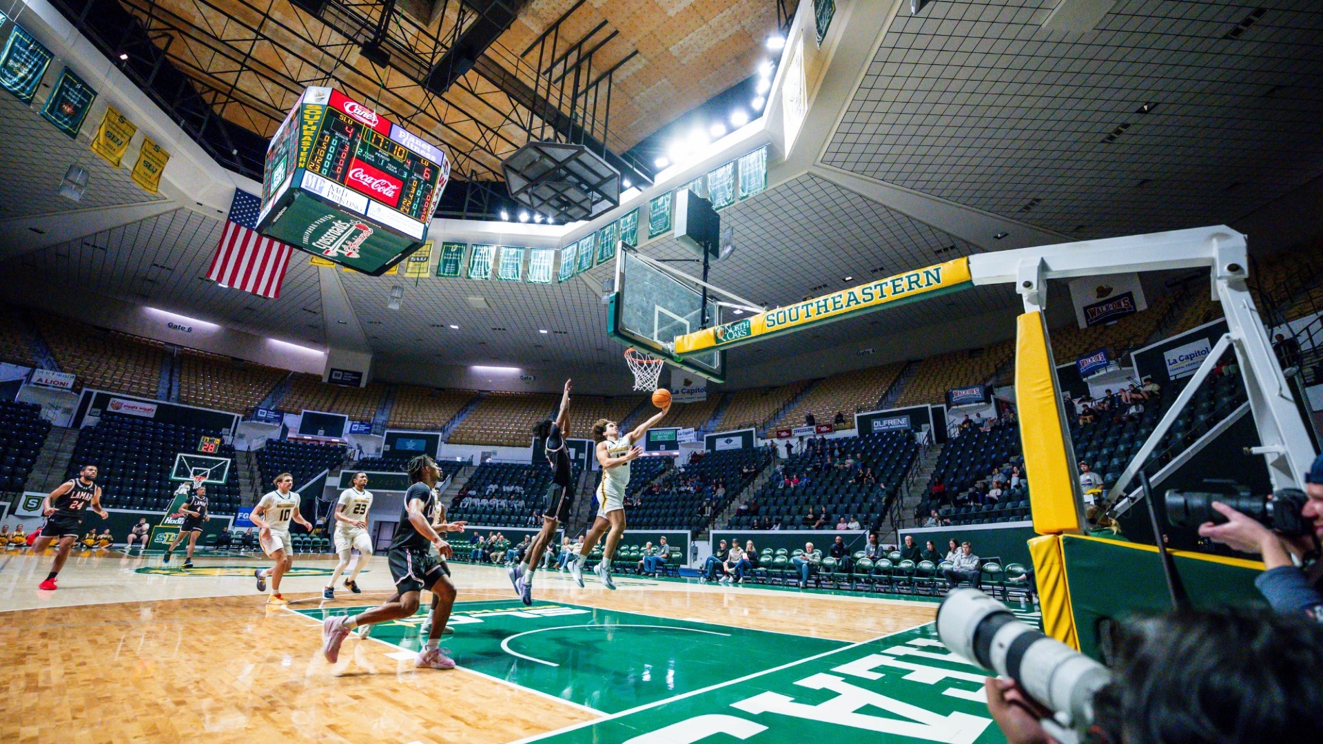 Ahmed Essahaty finishing around the rim vs Lamar defender