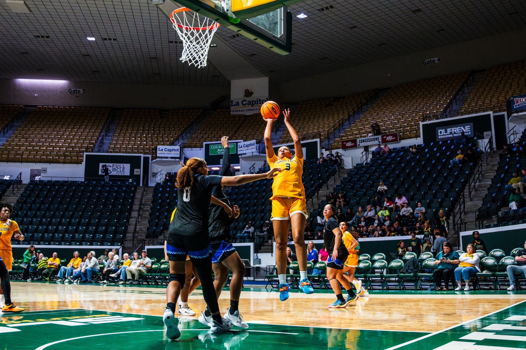 Eryn McKinzie shoots a jumper in the University Center