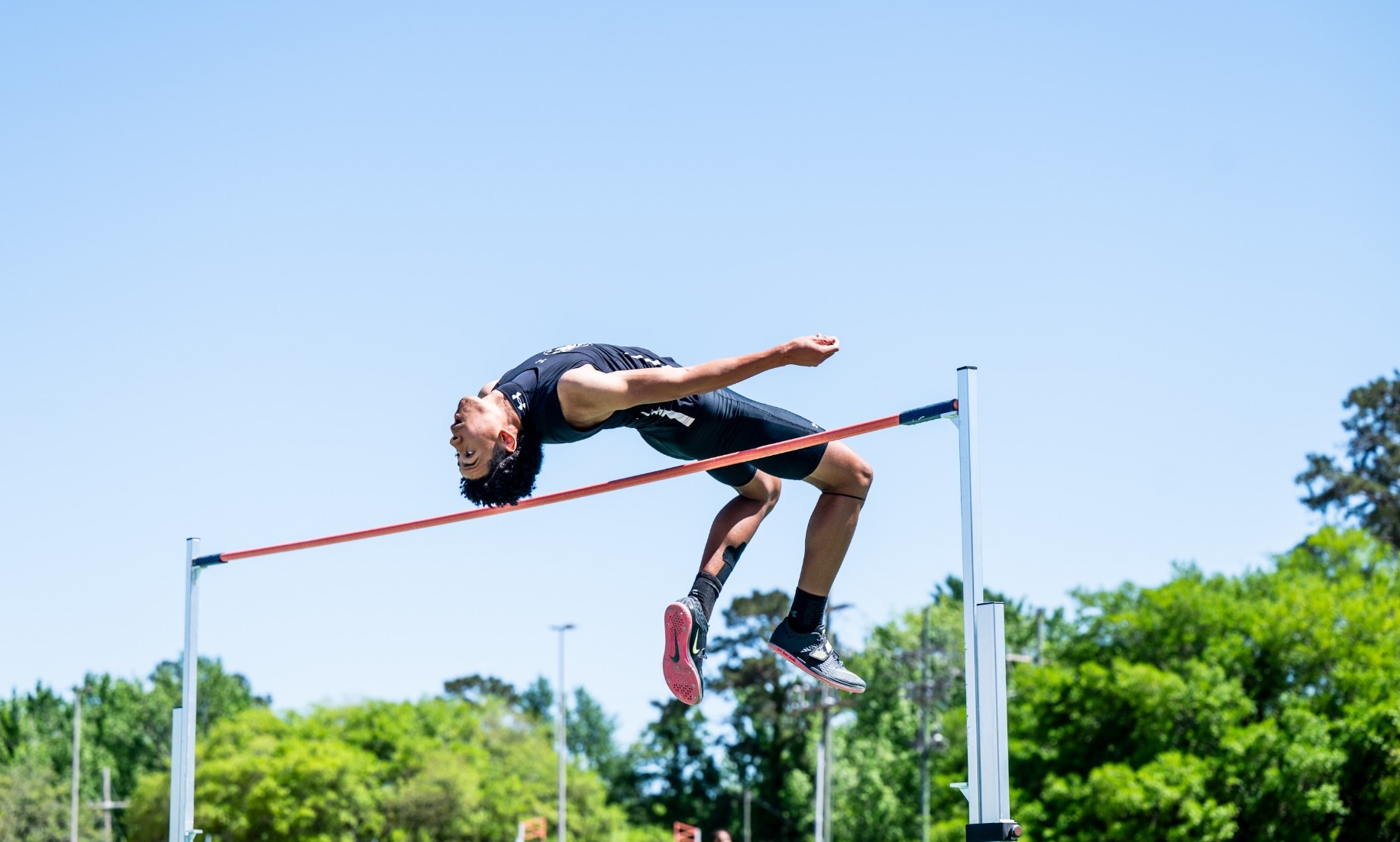 Alden Dupree jumps at the Southeastern Track Complex 