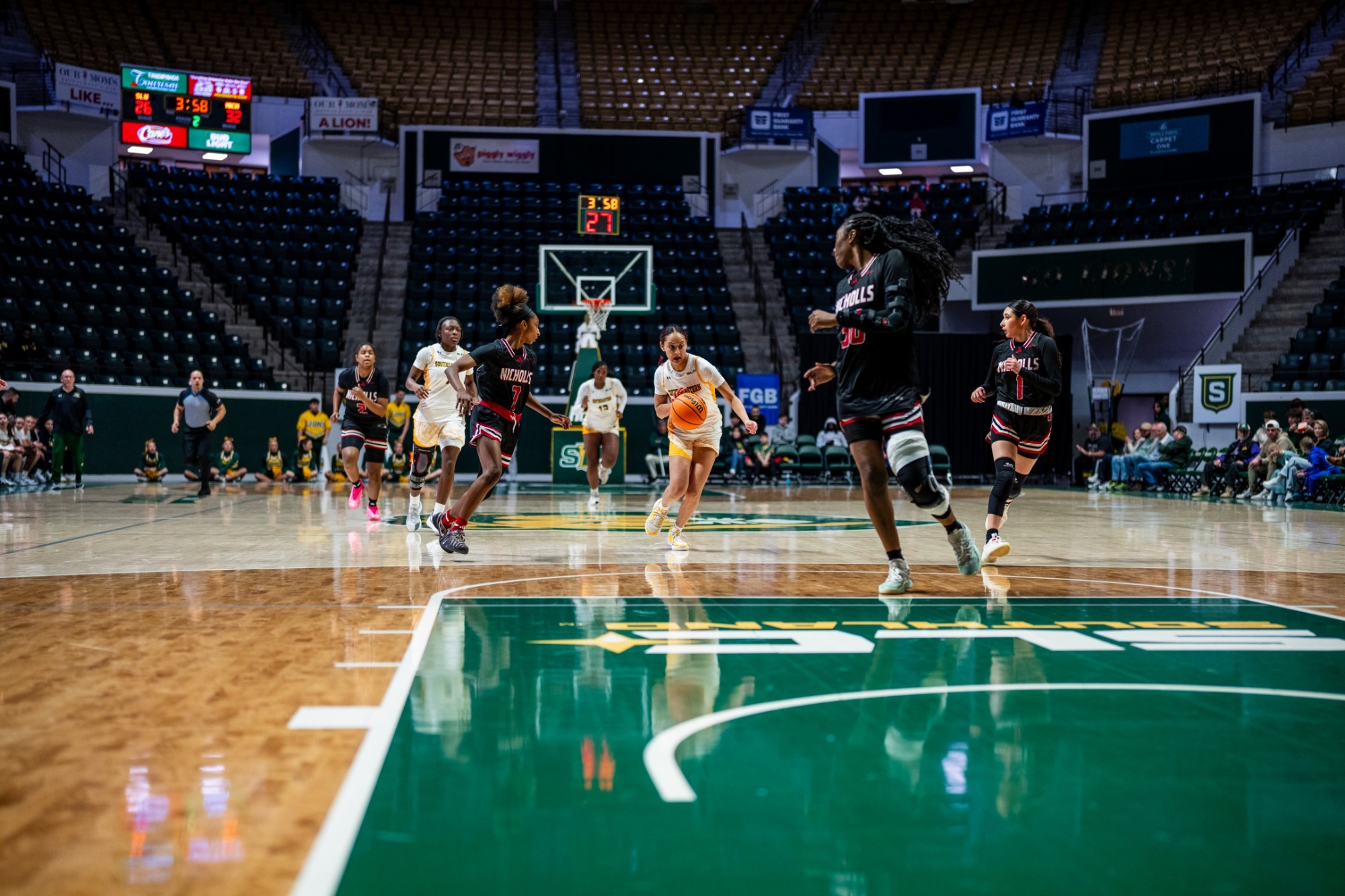 Natalie Huff drives past defenders in the University Center