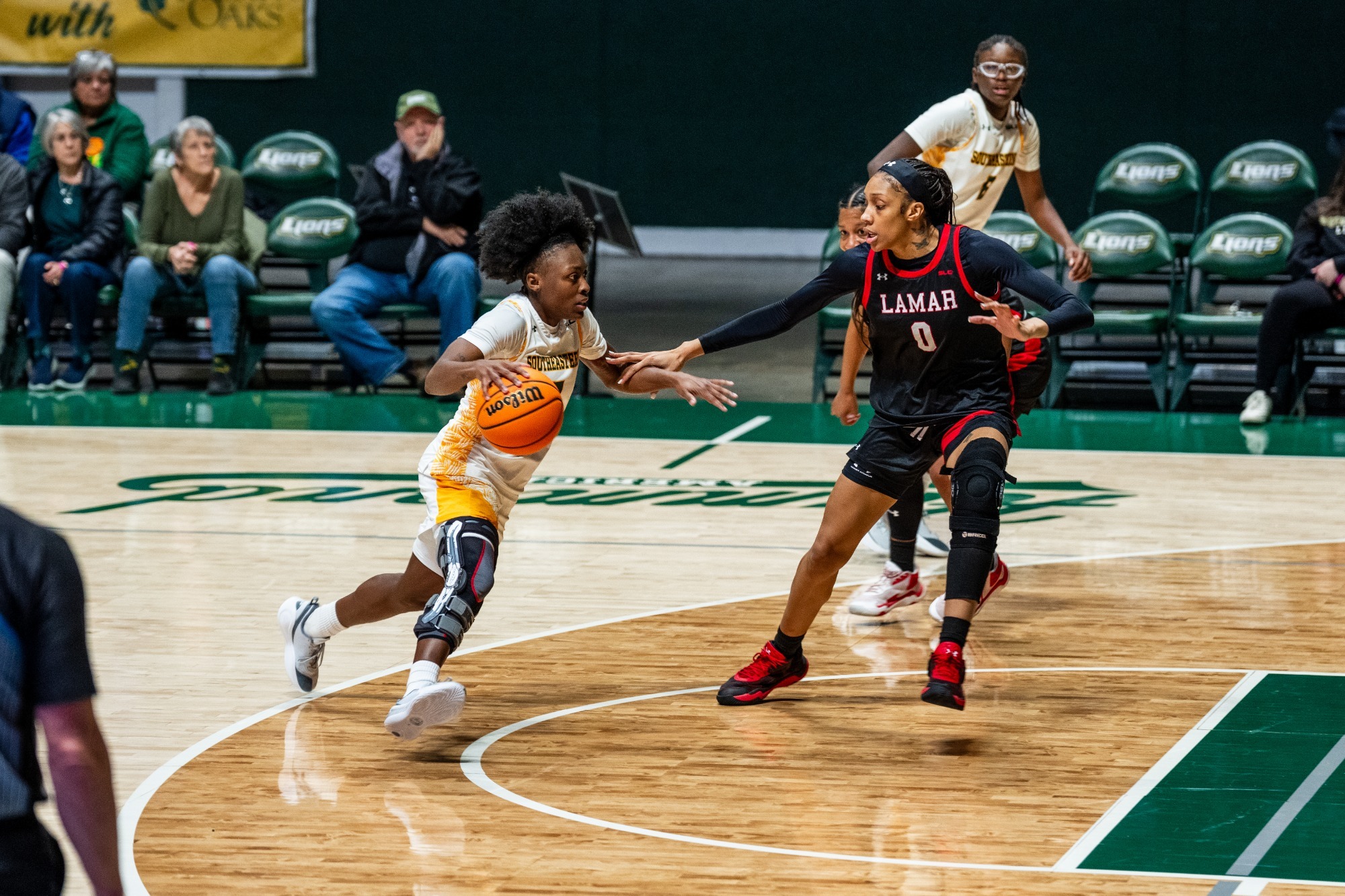 Aliyah Collins goes against the defense in the University Center