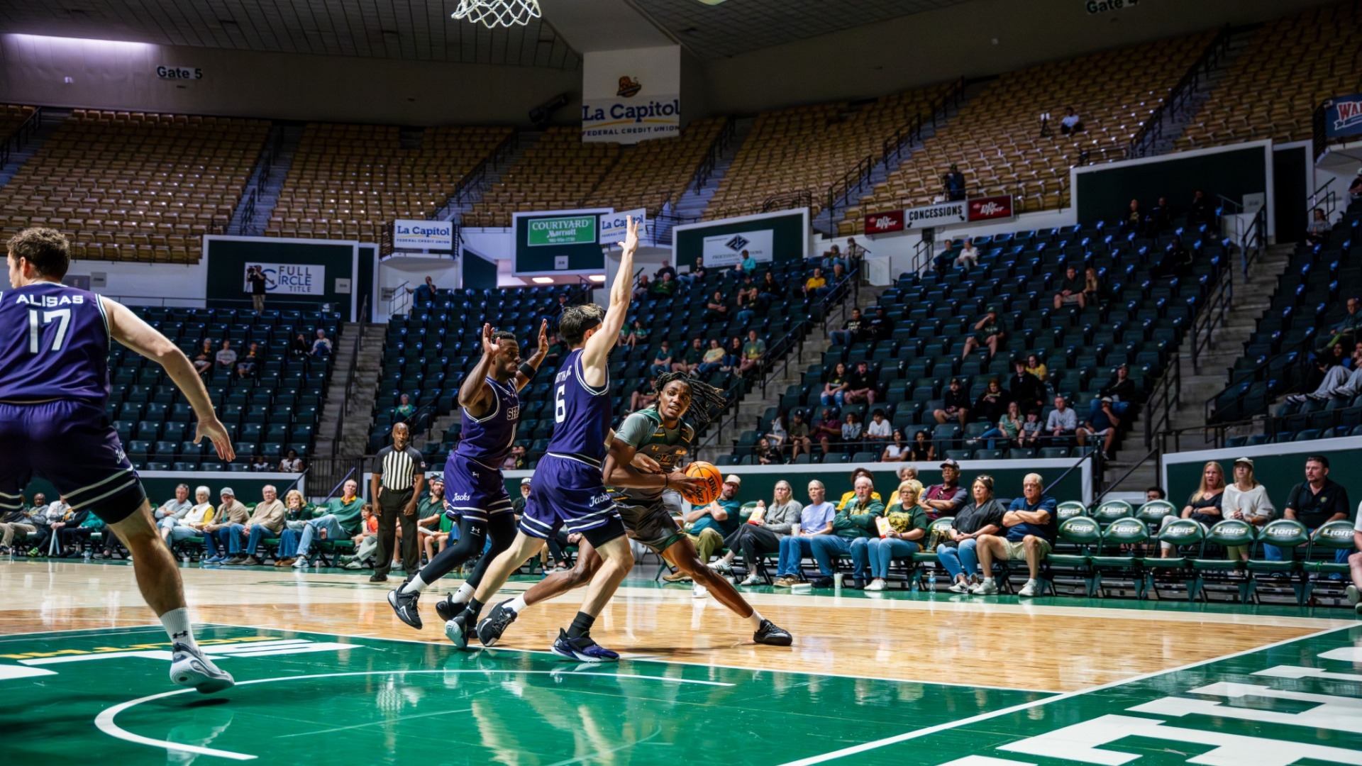 MBB: Makhi Myles around the rim vs multiple SFA defenders