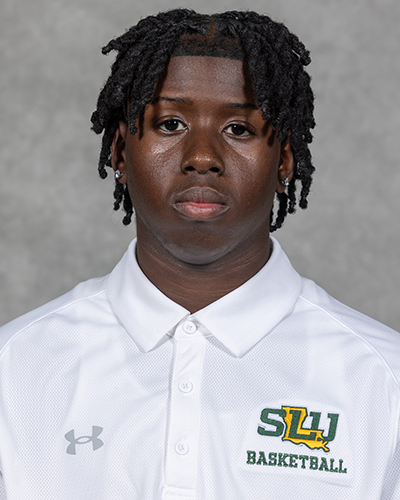 Southeastern men's basketball manager poses for a headshot wearing a white Southeastern basketball polo