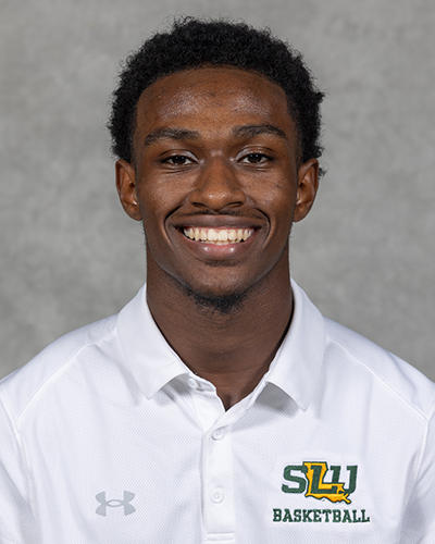 Southeastern men's basketball manager poses for a headshot wearing a white Southeastern basketball polo