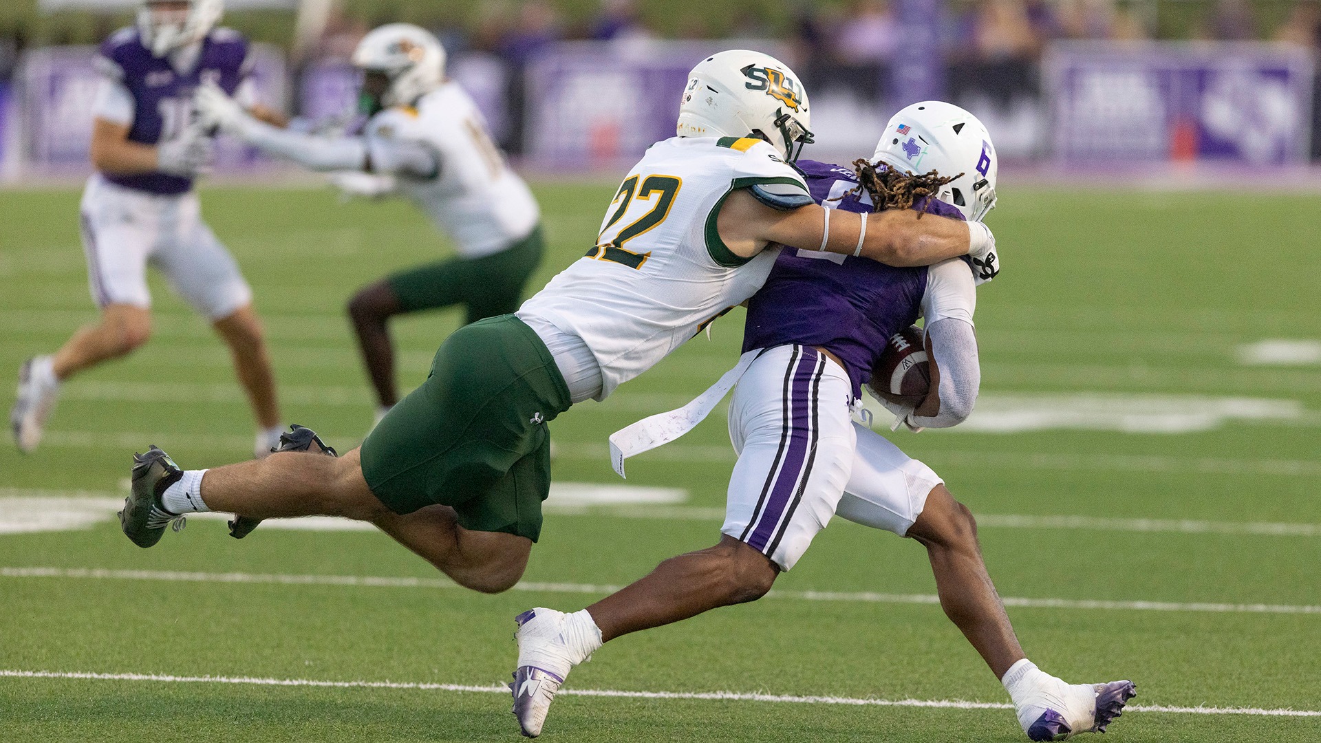 Carter Hanberry (22) dives for a tackle at SFA Oct. 24, 2026