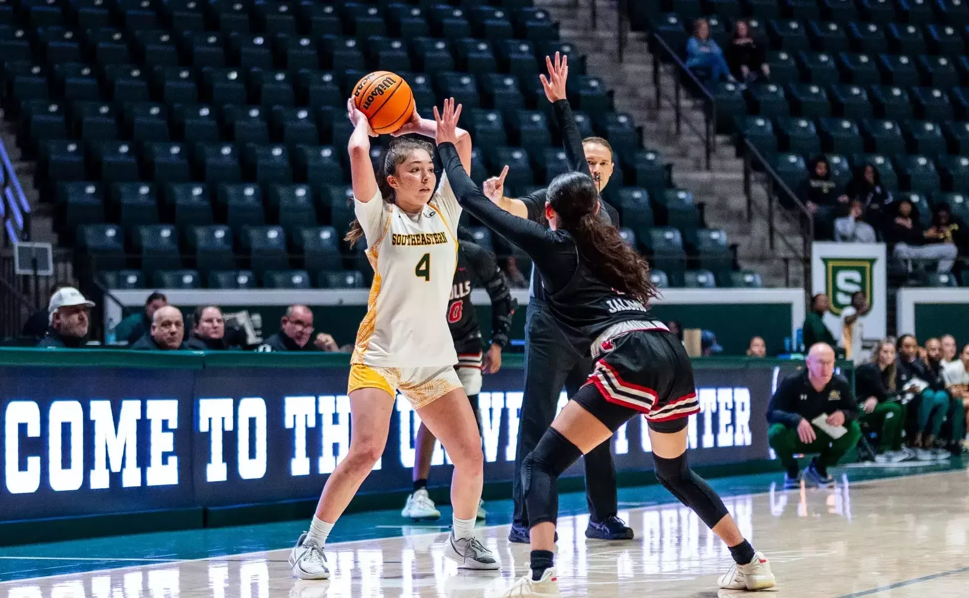 Mia Ramos looks to pass in the University Center