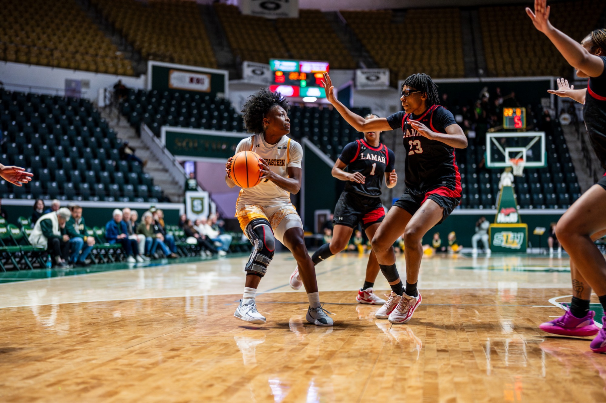 Aliyah Collins looks to pass in the University Center