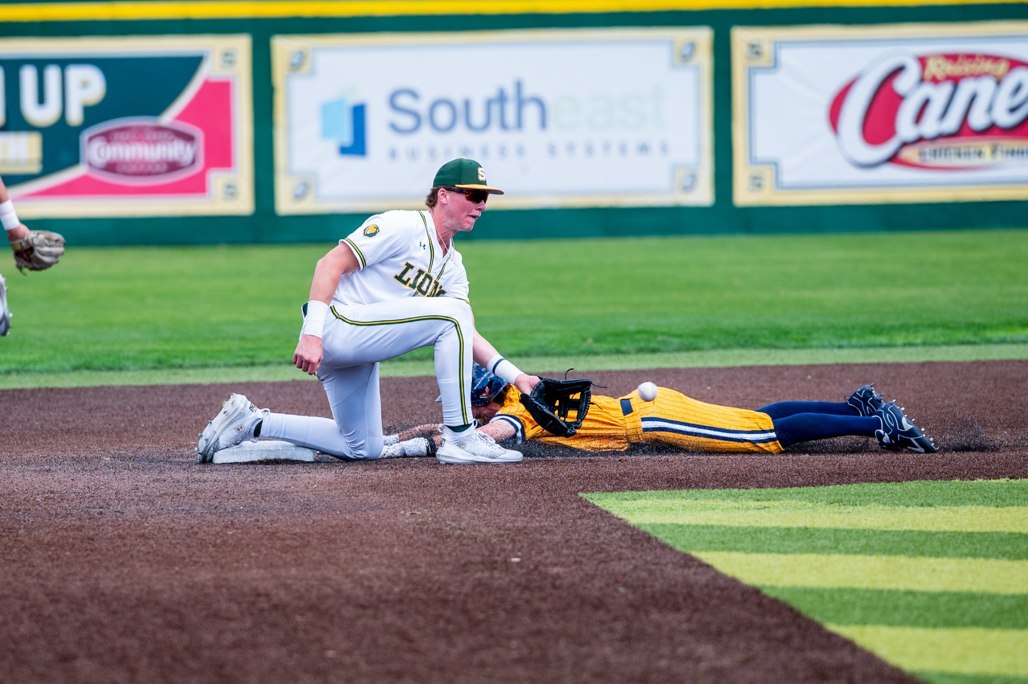 Connor Cuff awaits a throw from the catcher on a Kent State stolen base attempt.
