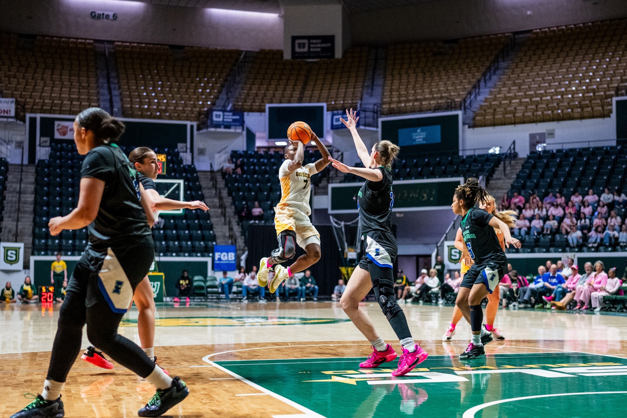 Aliyah Collins shoots a jumper in the University Center