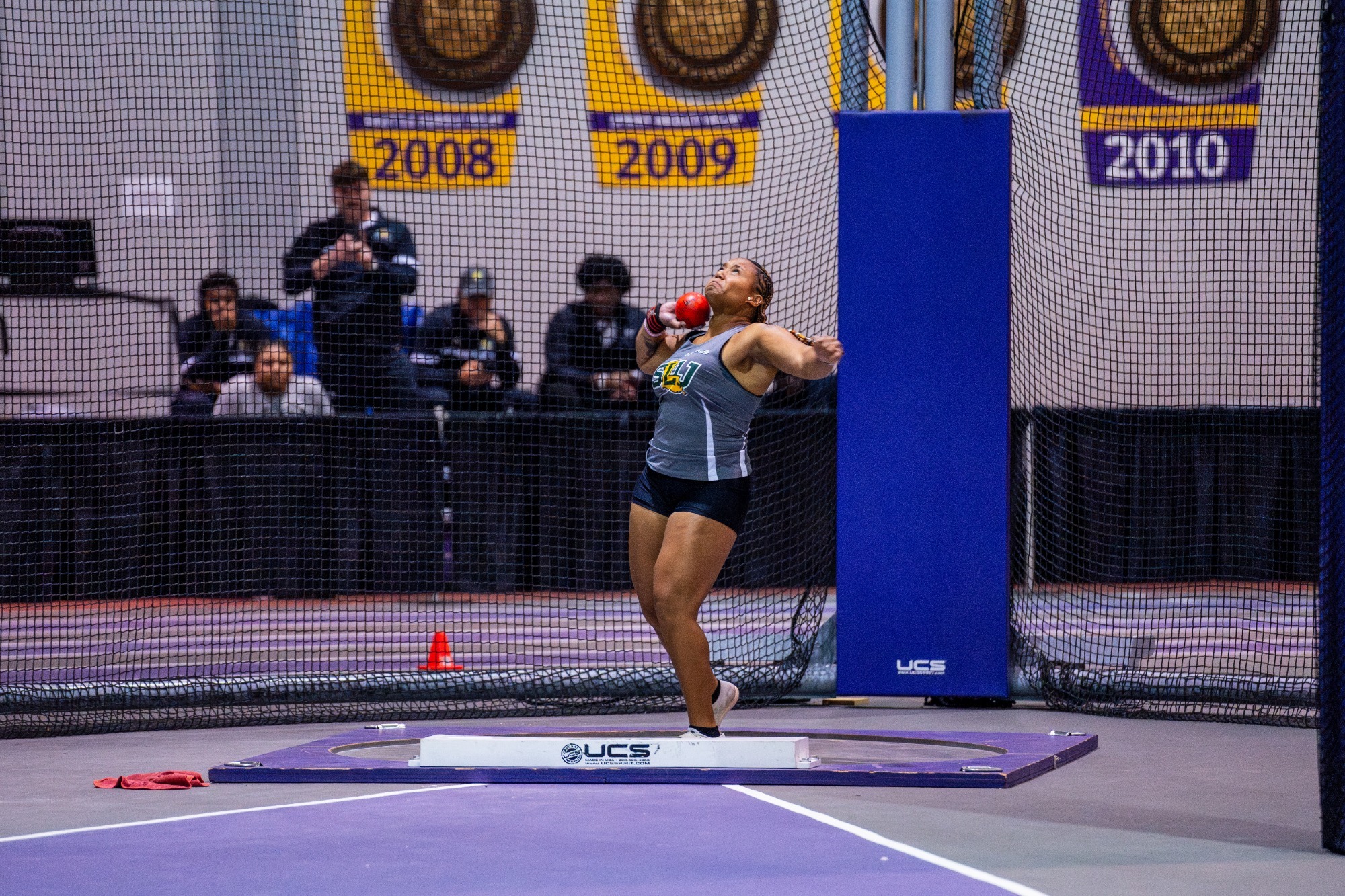 Jaydan Jackson prepares to throw at Carl Maddox Field House