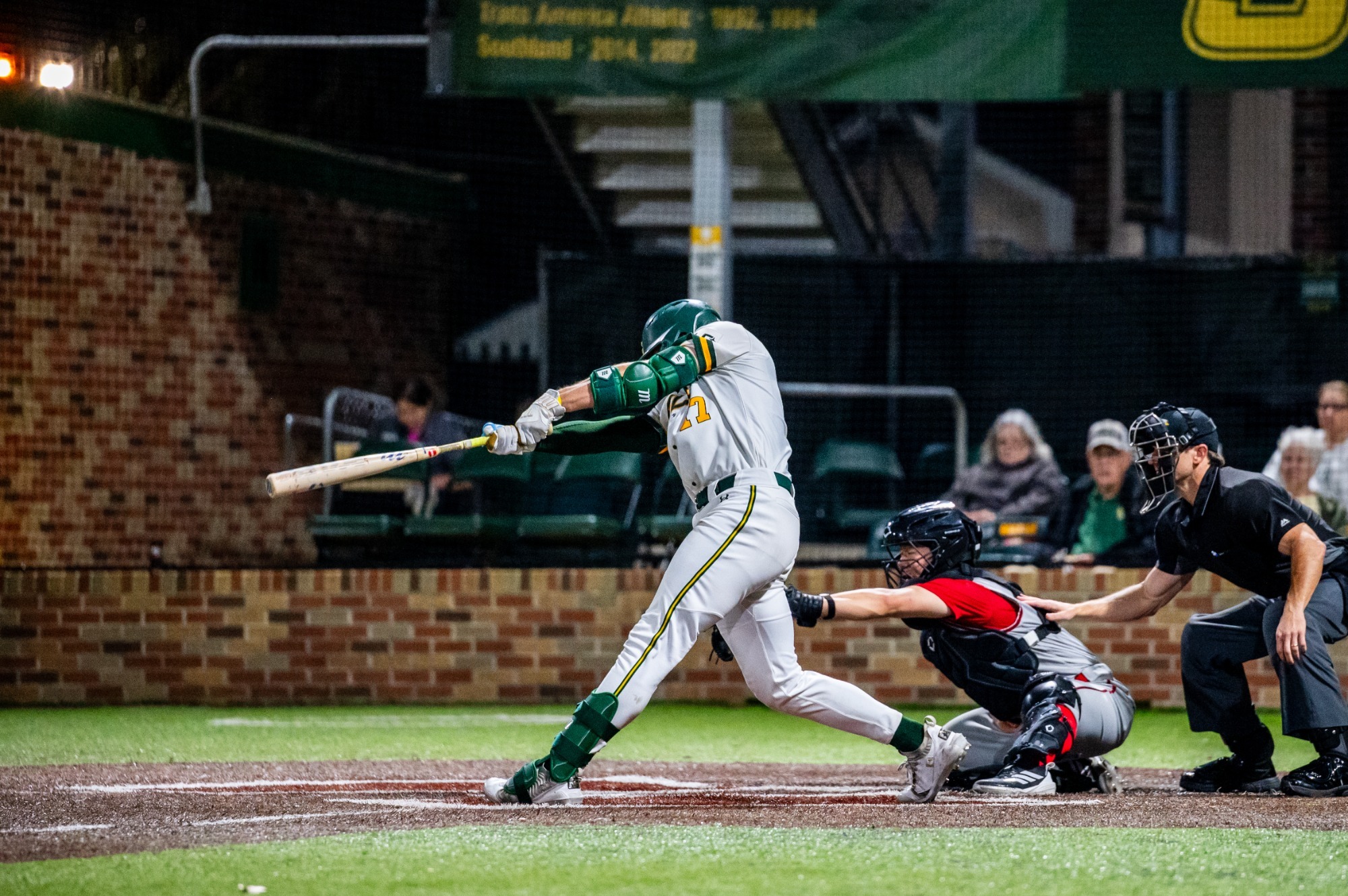 Brody Capps drives the ball out of the ballpark.