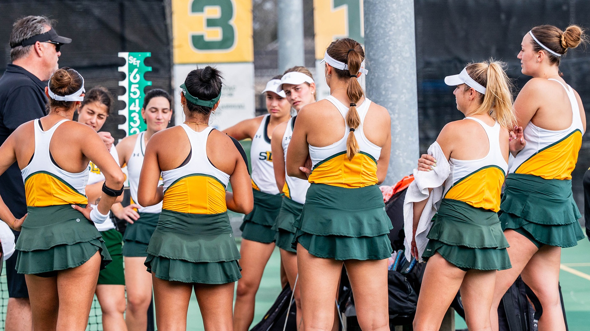 The Southeastern tennis team receives instruction from head coach Jason Hayes prior to its match with Chattanooga Feb. 21, 2026