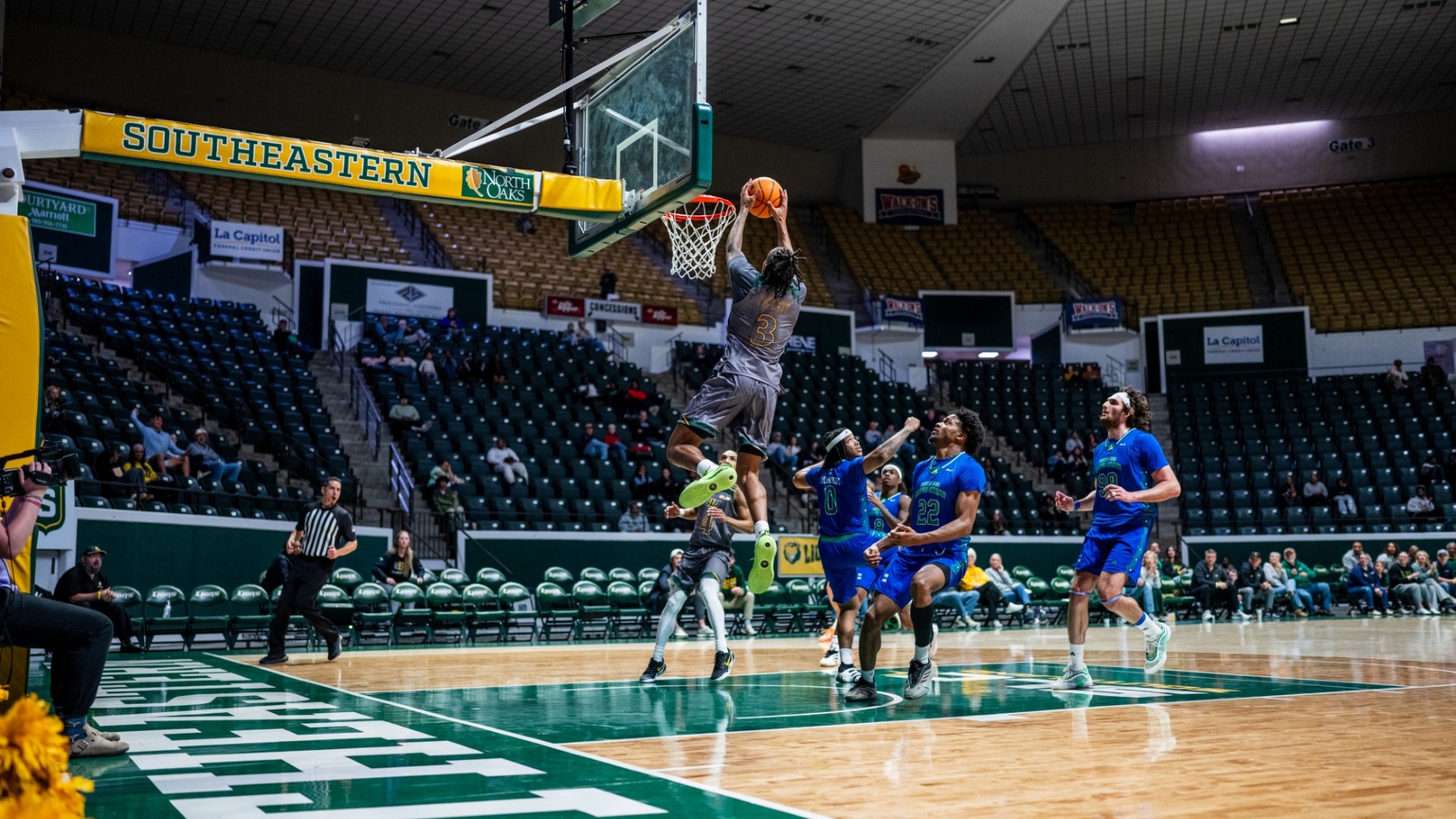 Ethan Pickett with a slam dunk in transition vs Texas A&M-Corpus Christi defenders