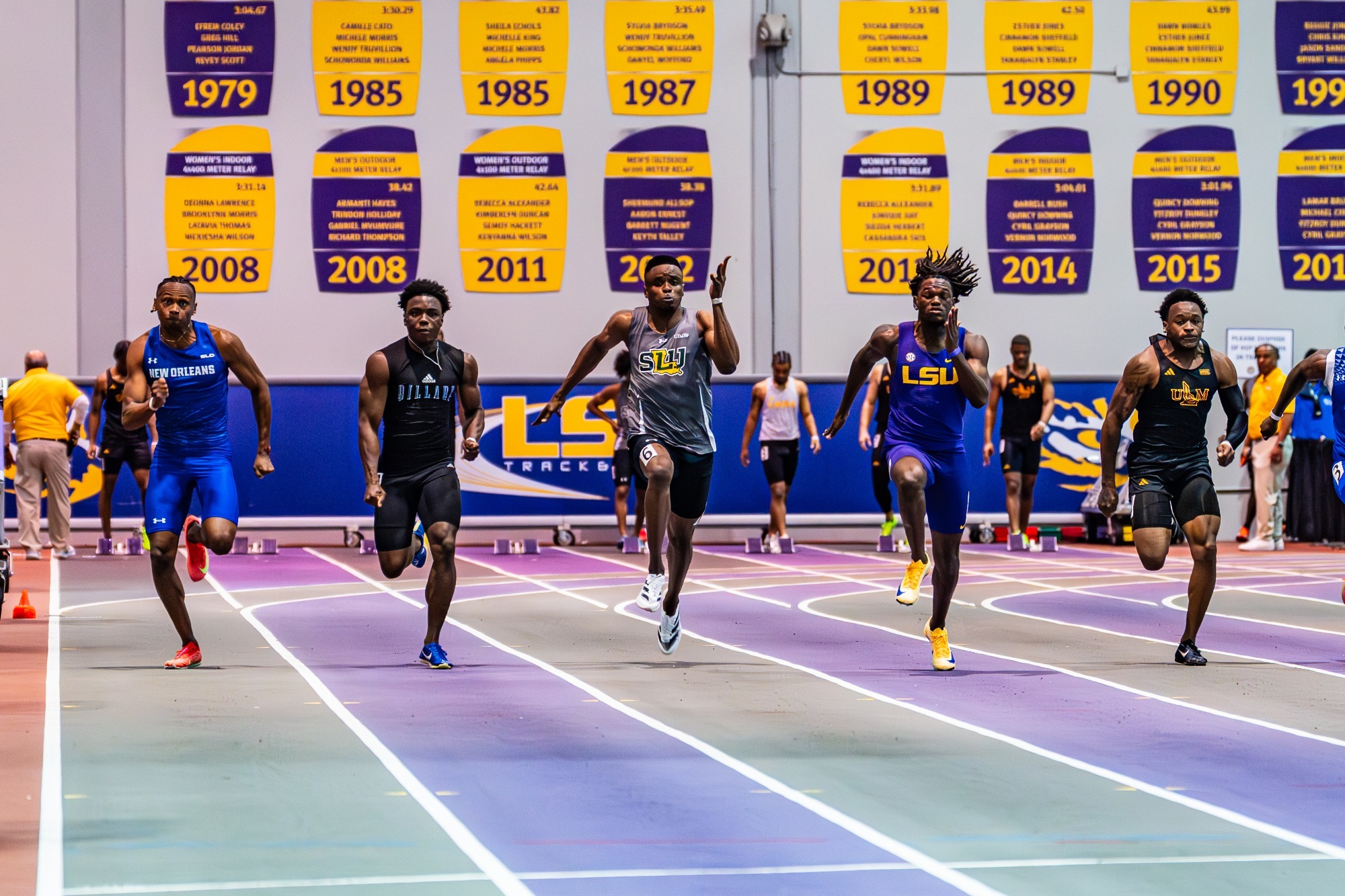 Daniel Atinaya runs in the Carl Maddox Field House