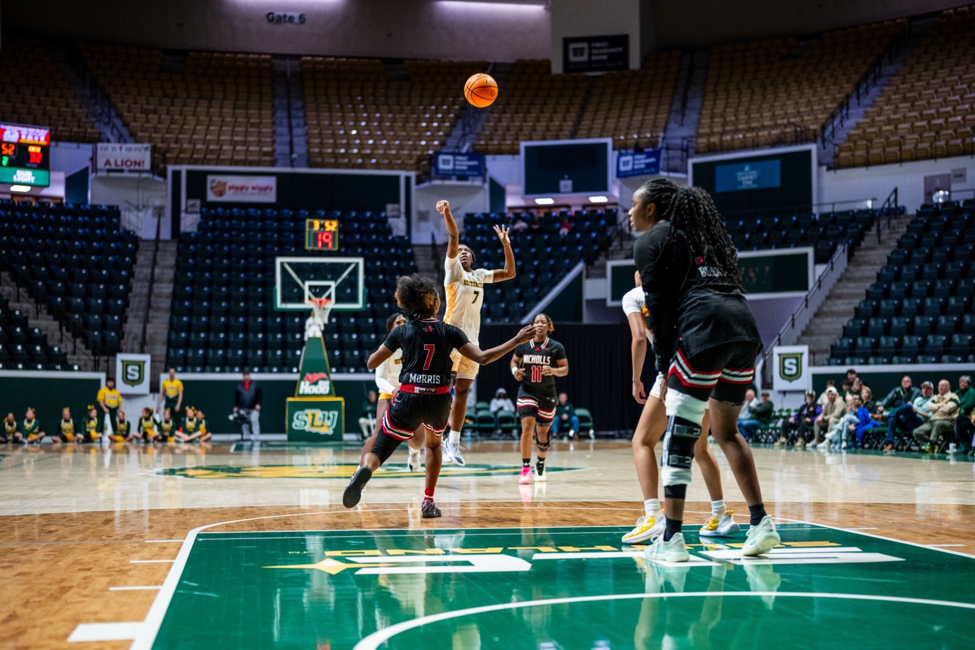 Aliyah Collins shoots a jumper in the University Center