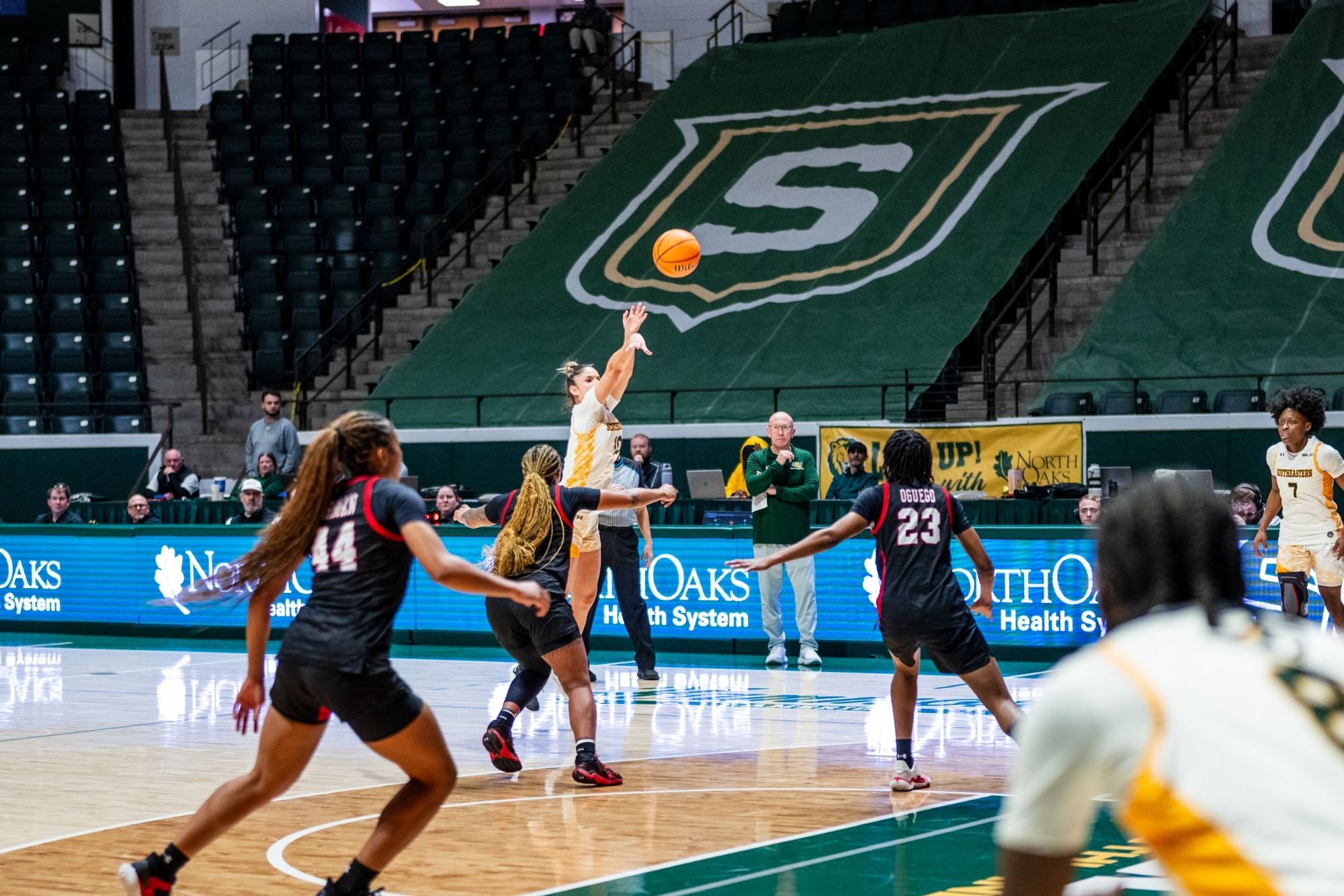 Lihi Azouri shoots a three-pointer in the University Center