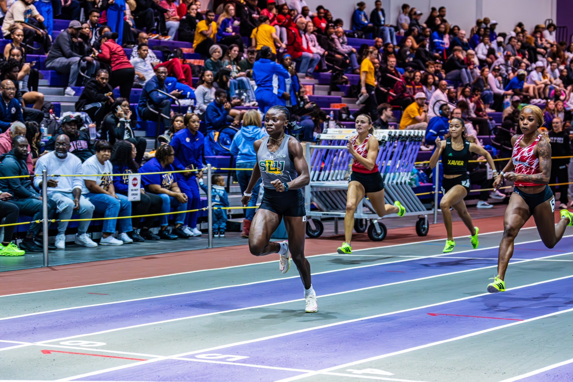 Onyah Favour runs at the LSU Purple Tiger meet