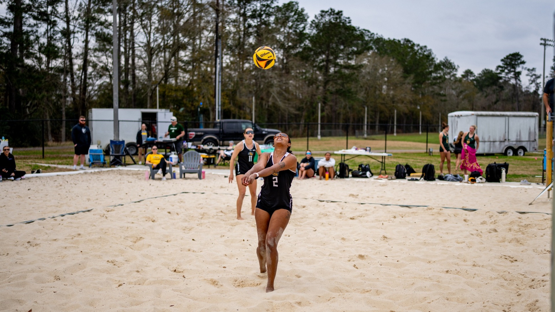 Makayla Hicks and Cadie Kusy working on a return over the net in the Green vs Gold match