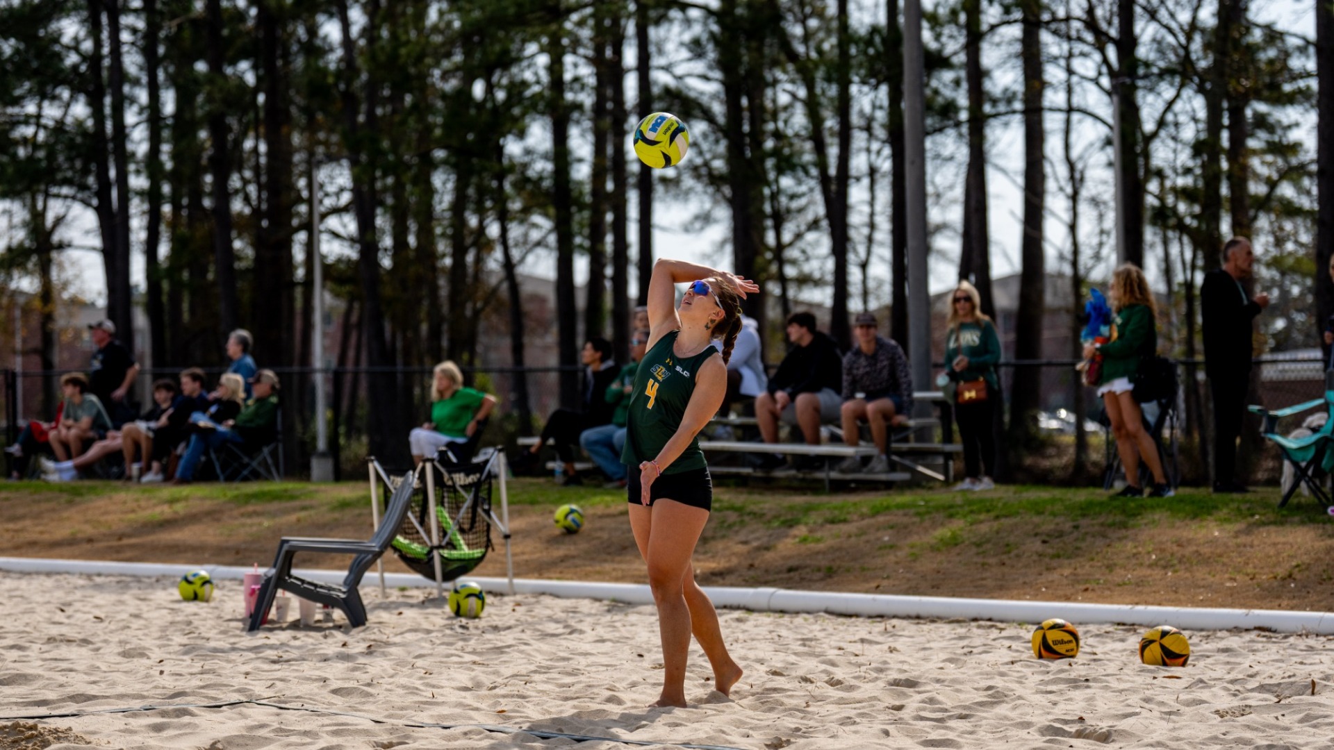 Maggie Paiva opening serve in Green vs Gold match