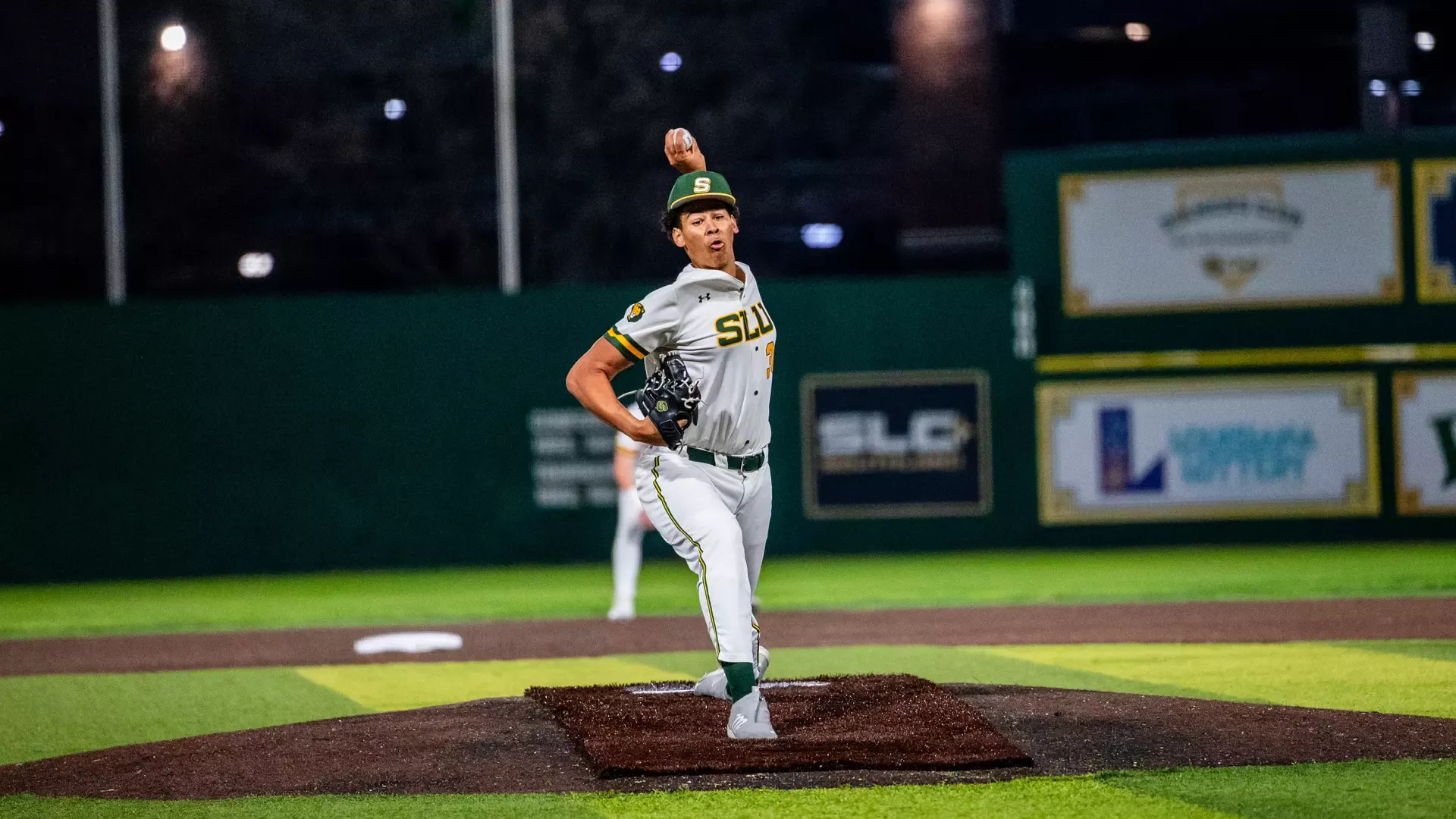 Nik Toups delivers a pitch to the plate.