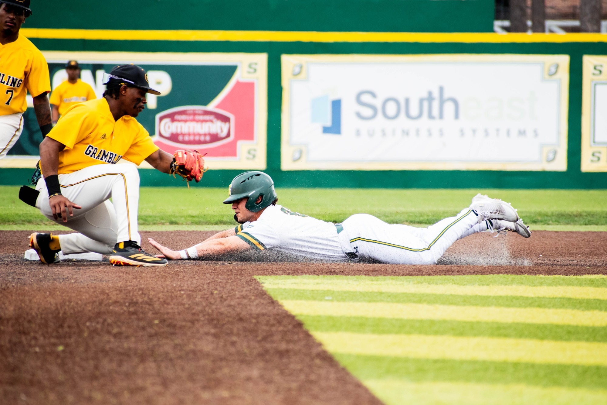 Ben Robichaux slides into second base on a steal attempt against Grambling.