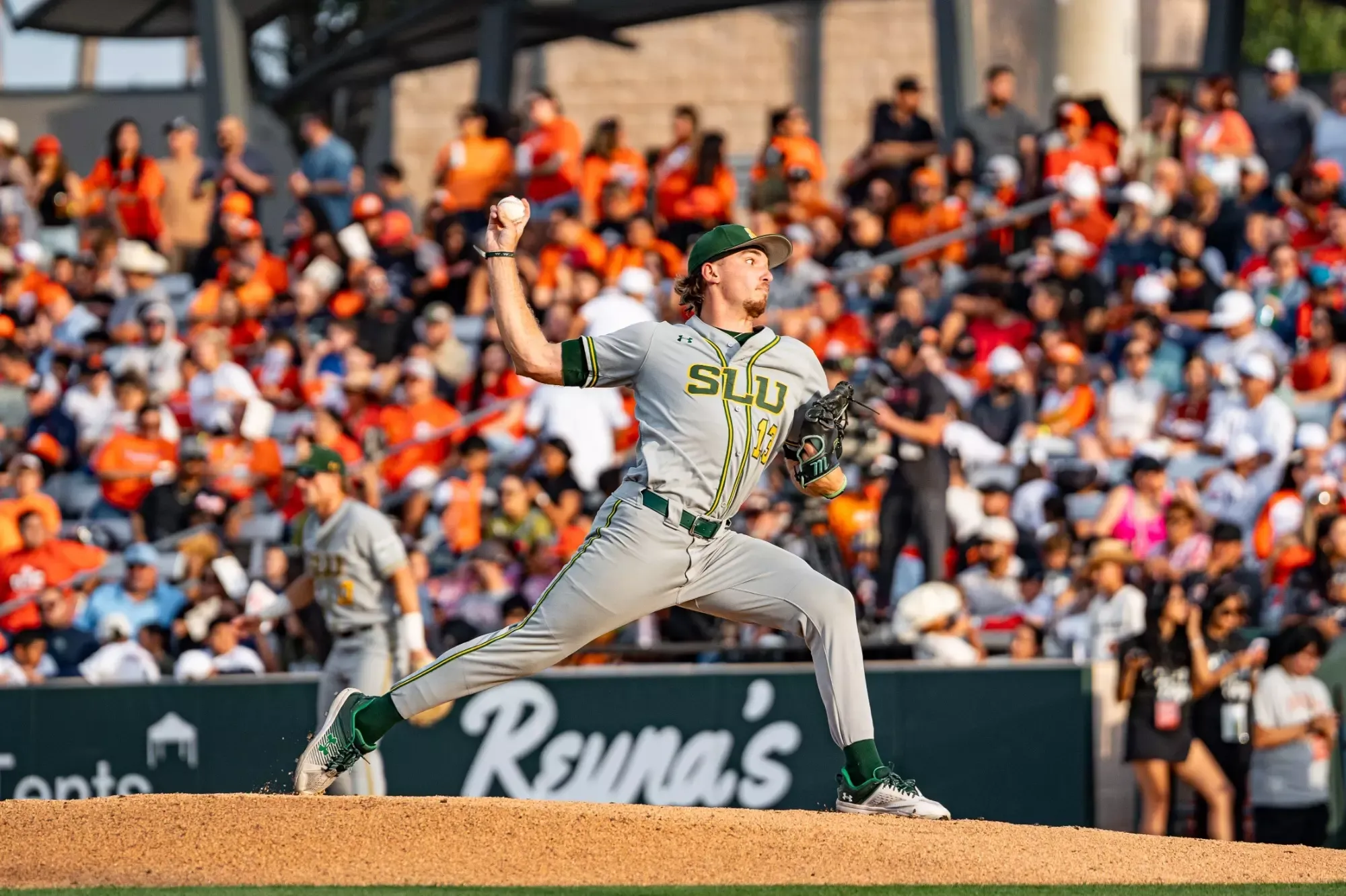 Truitt Webb delivers a pitch in front of a sold-out crowd in Edinburg, Texas.