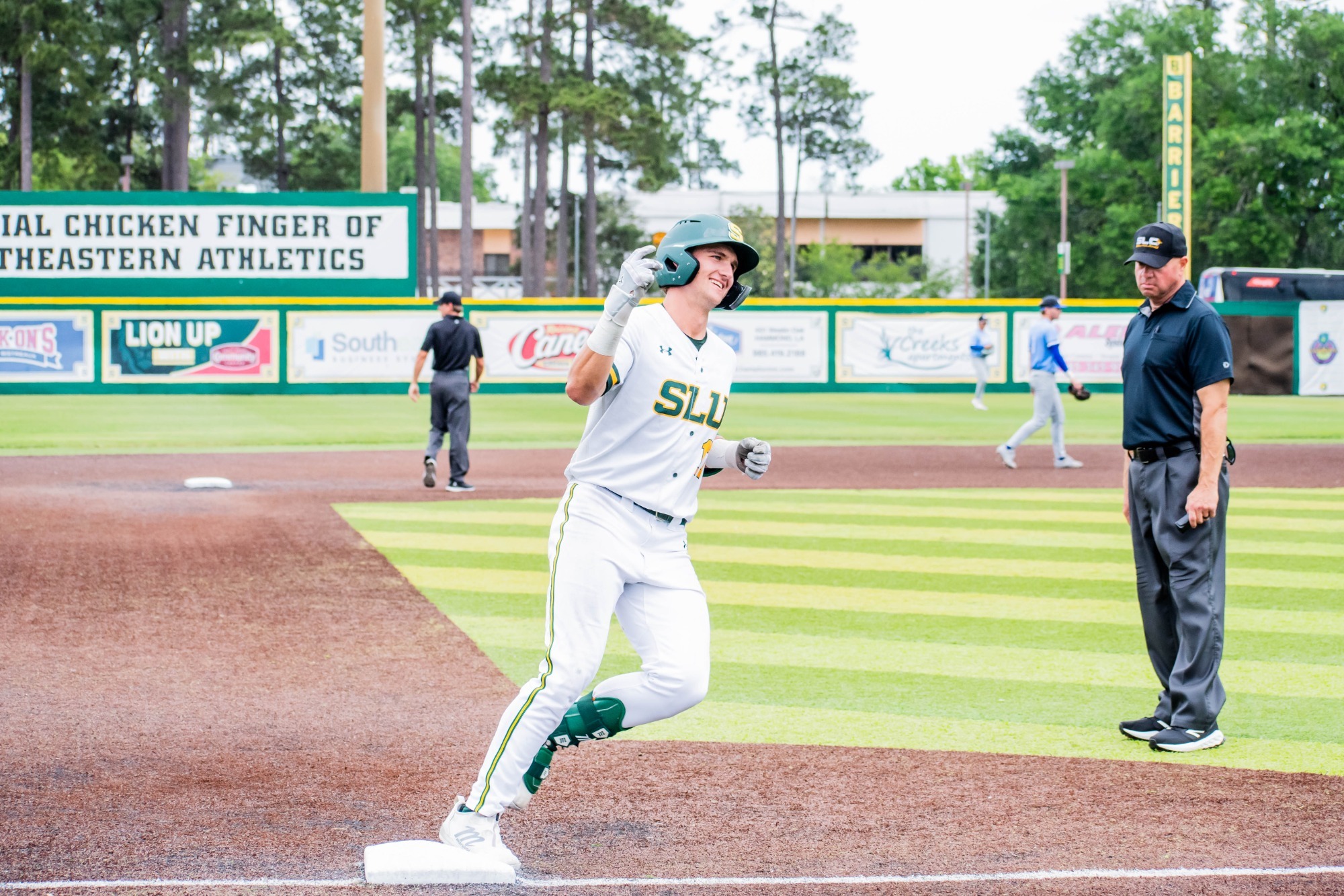 Brody Capps rounds third after hitting a game-ending grand slam.