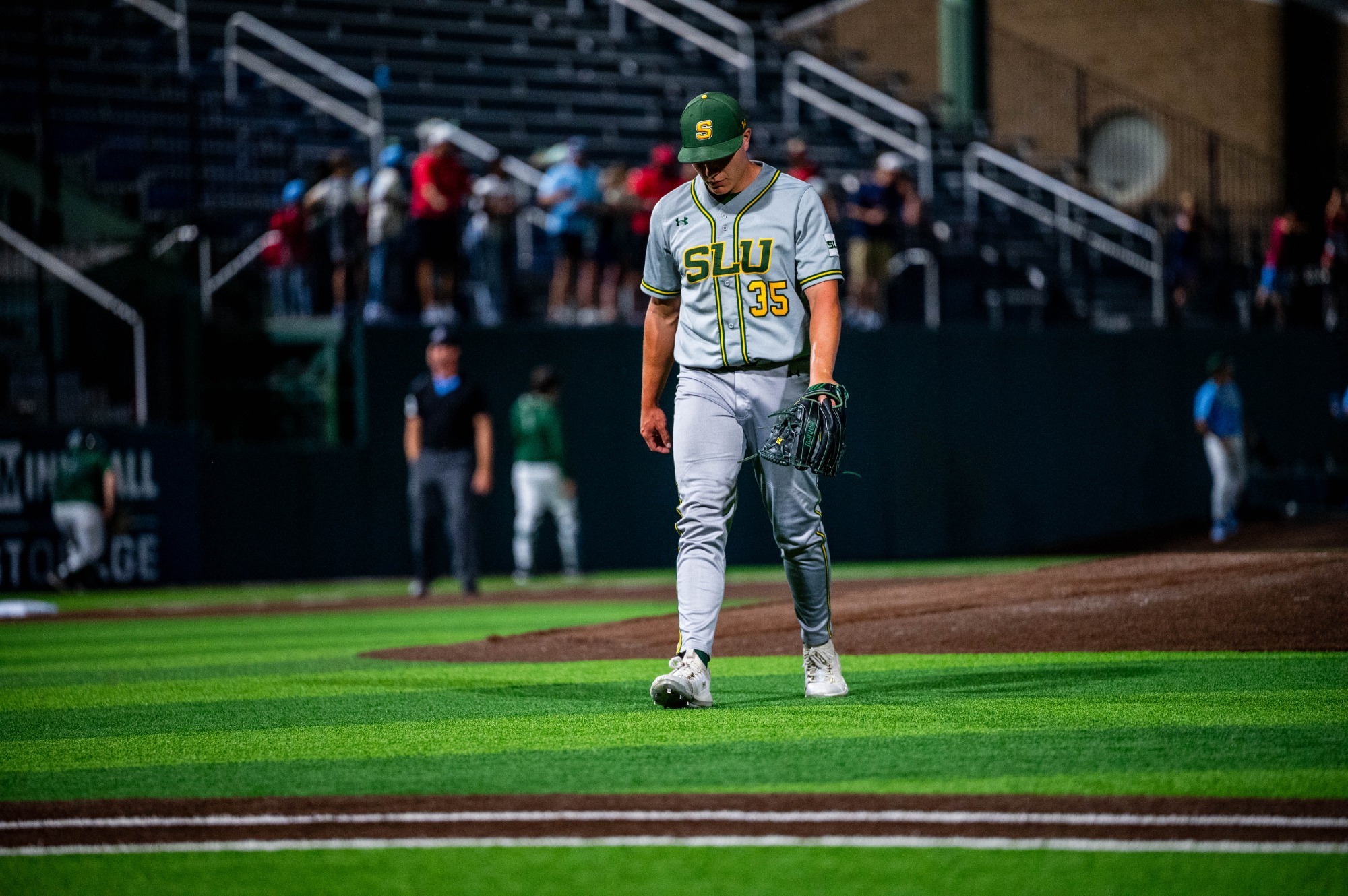Dalton Gray walks off the mound after wrapping up the inning.