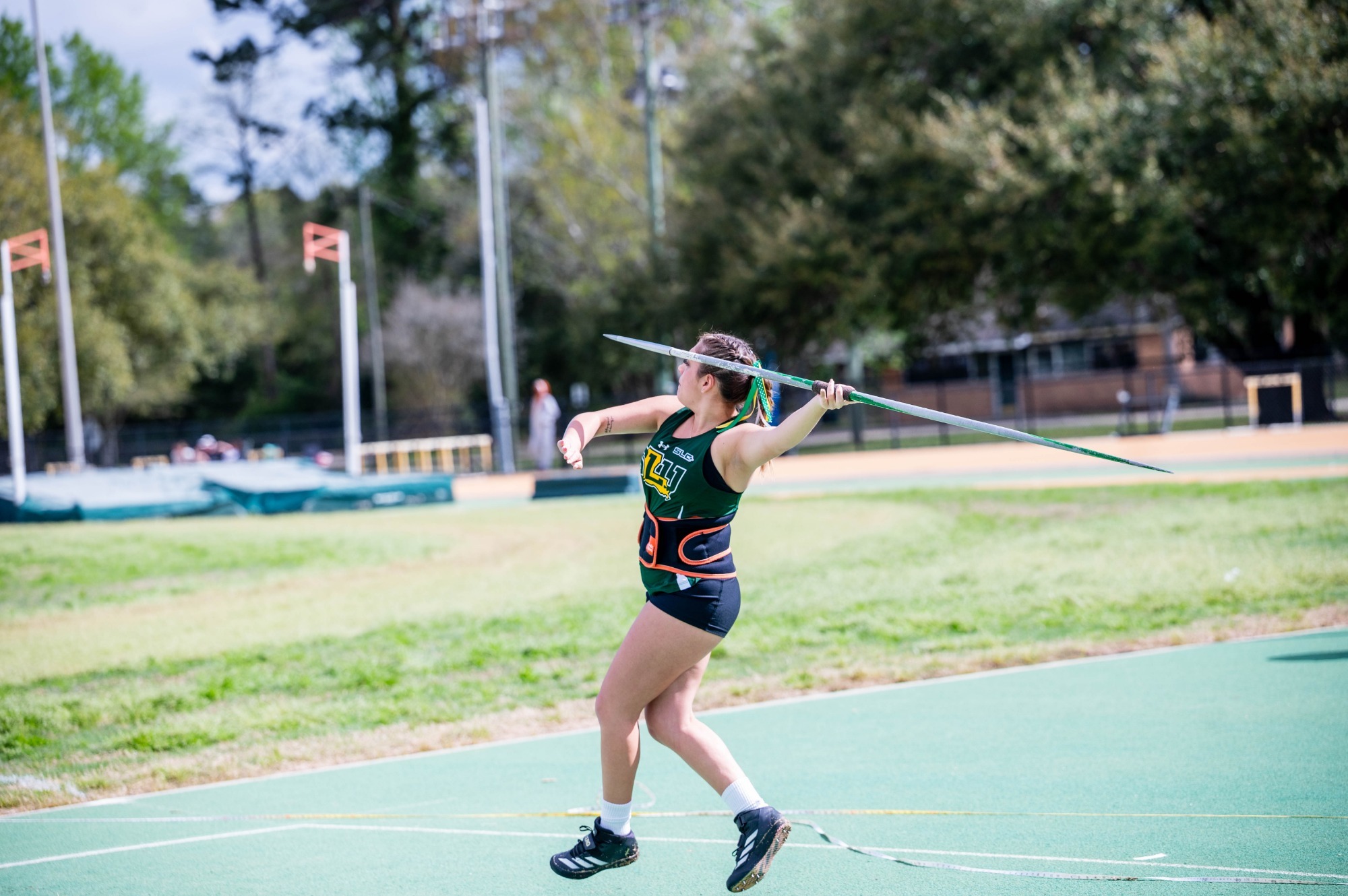 Bailey Babin throws the javelin at the Andy Thiel Season Opener