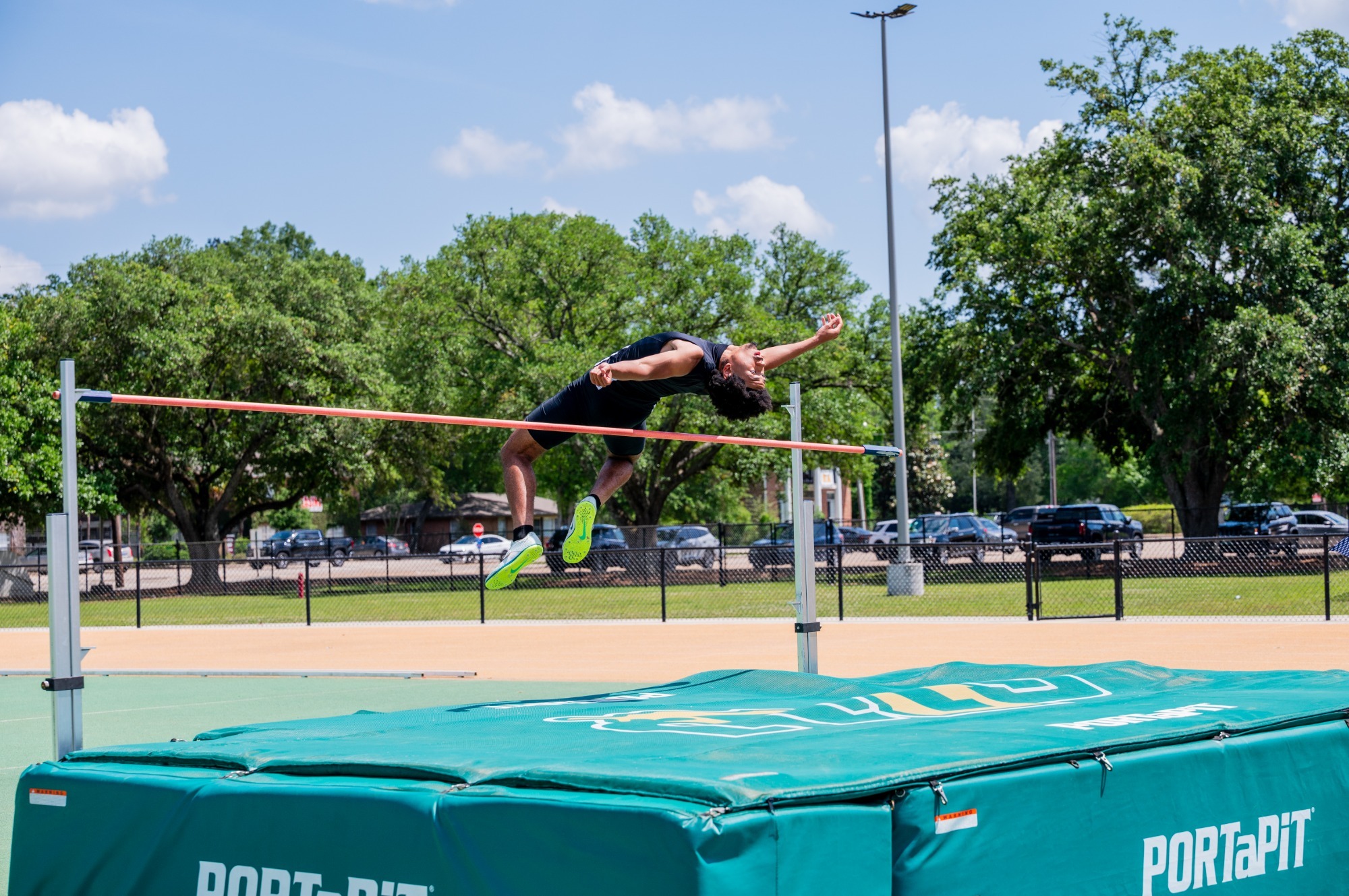 Alden Dupree jumps at the Strawberry Relays