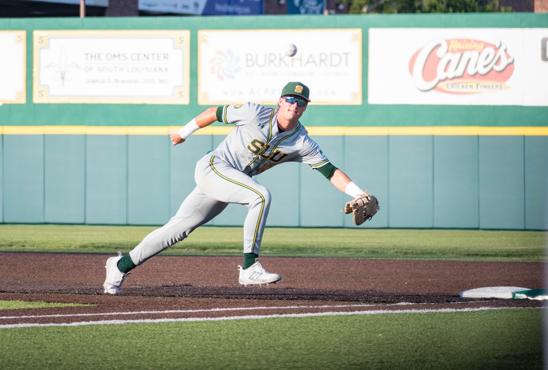 Brody Capps reaches for a hard-hit ball.