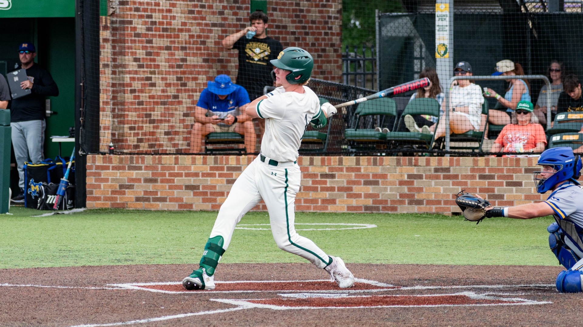 Connor Cuff drives the ball out of the ballpark.