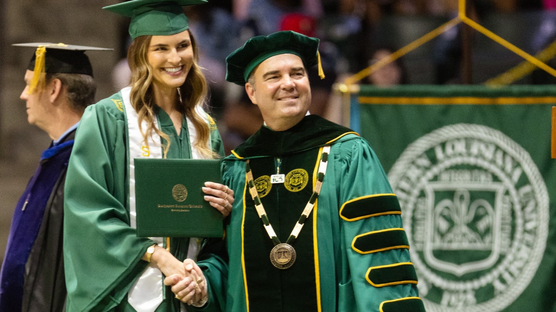 Alexis Logarbo and President Dr. William Wainwright at Spring 2026 Commencement May 16, 2026