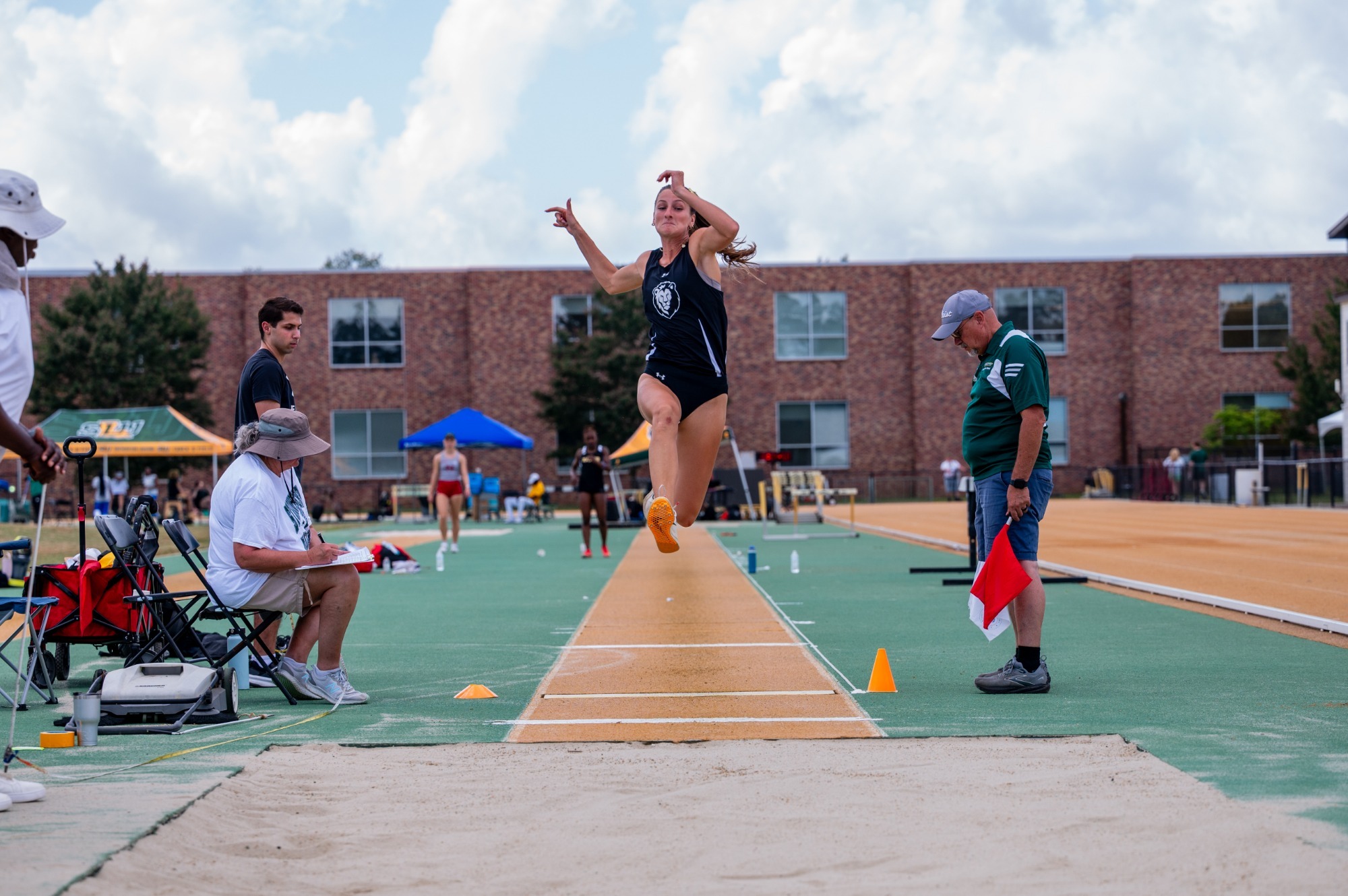Julia Jenkins jumps at the Strawberry Relays