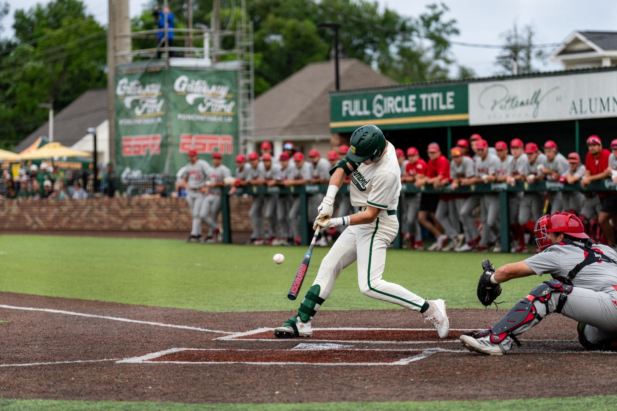 Peyton Woods drives the ball.