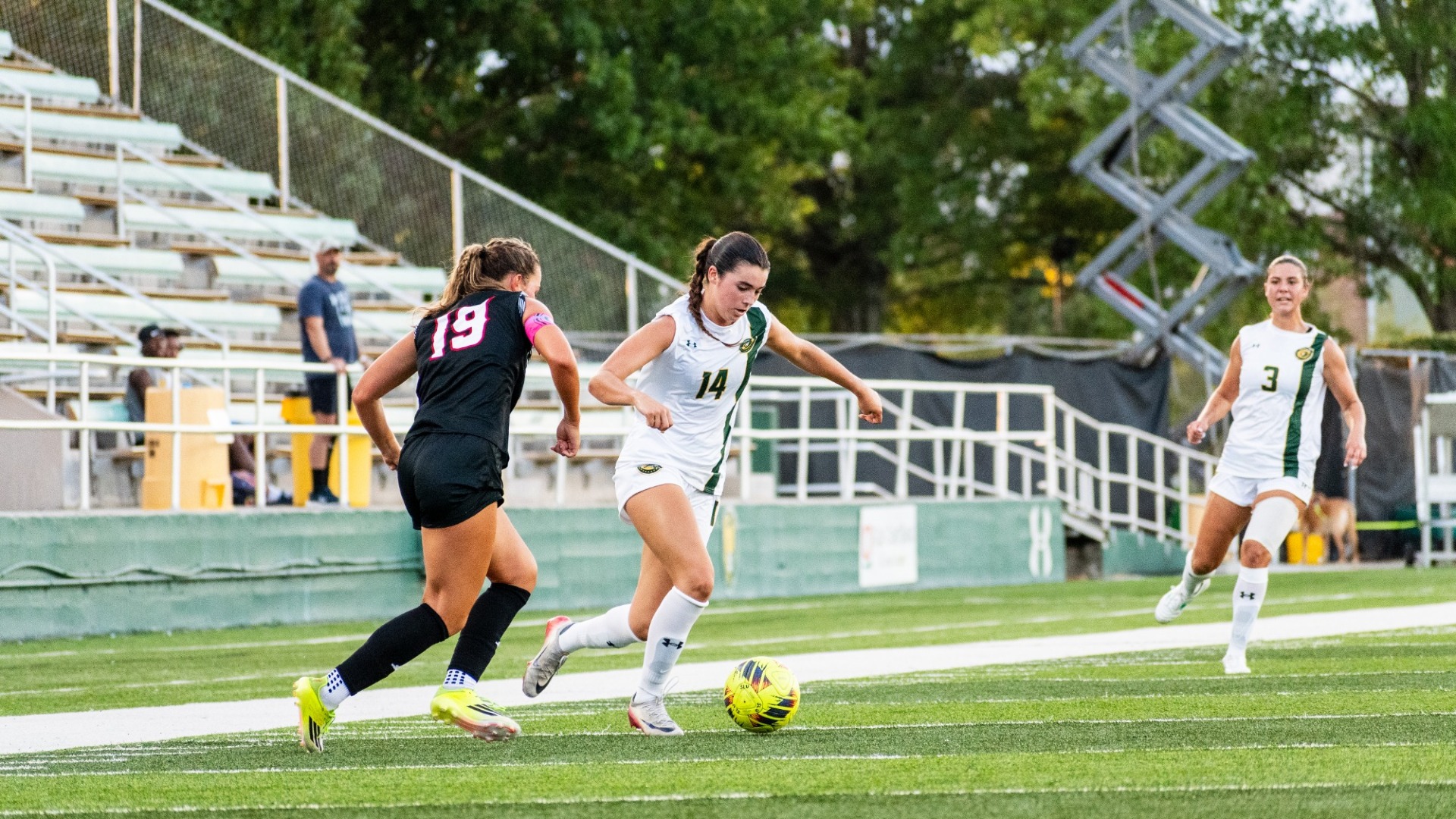 Women's soccer player Daniella Muro fighting for possession of the ball vs UL Lafayette defender at Strawberry Stadium for home match