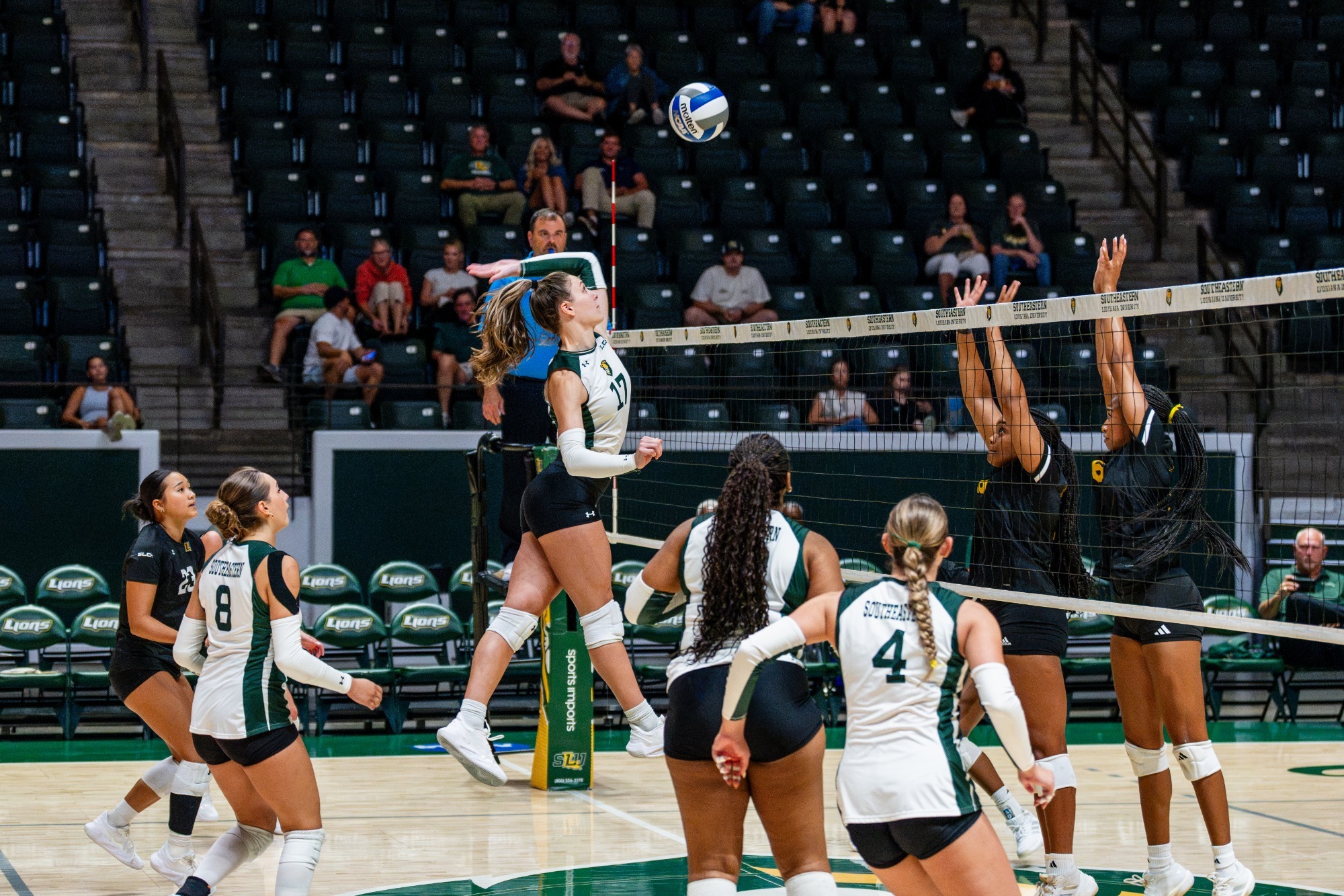 Kyra McKelvey swings for an attack in the University Center