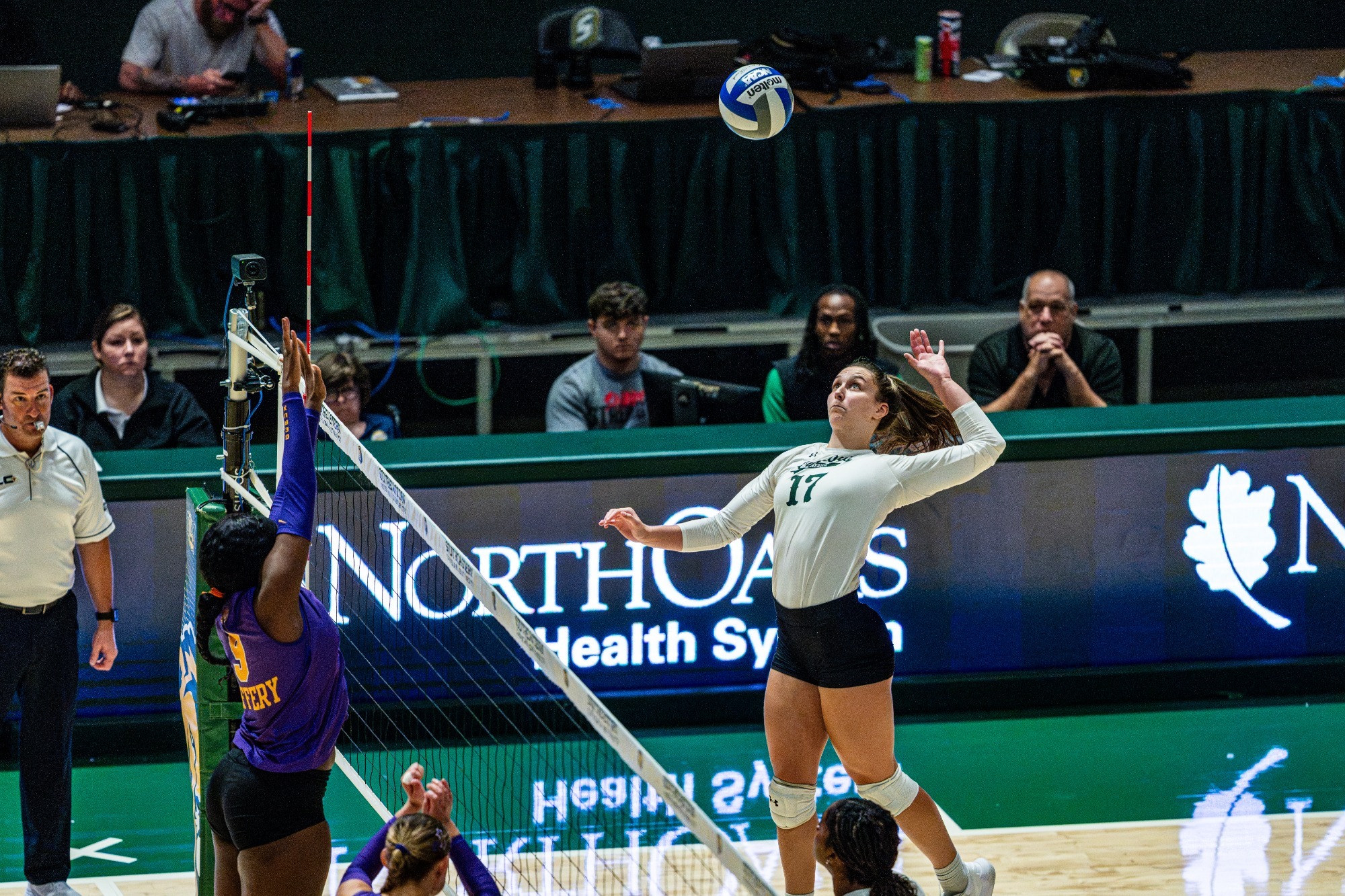 Kyra McKelvey jumps for a kill in the University Center