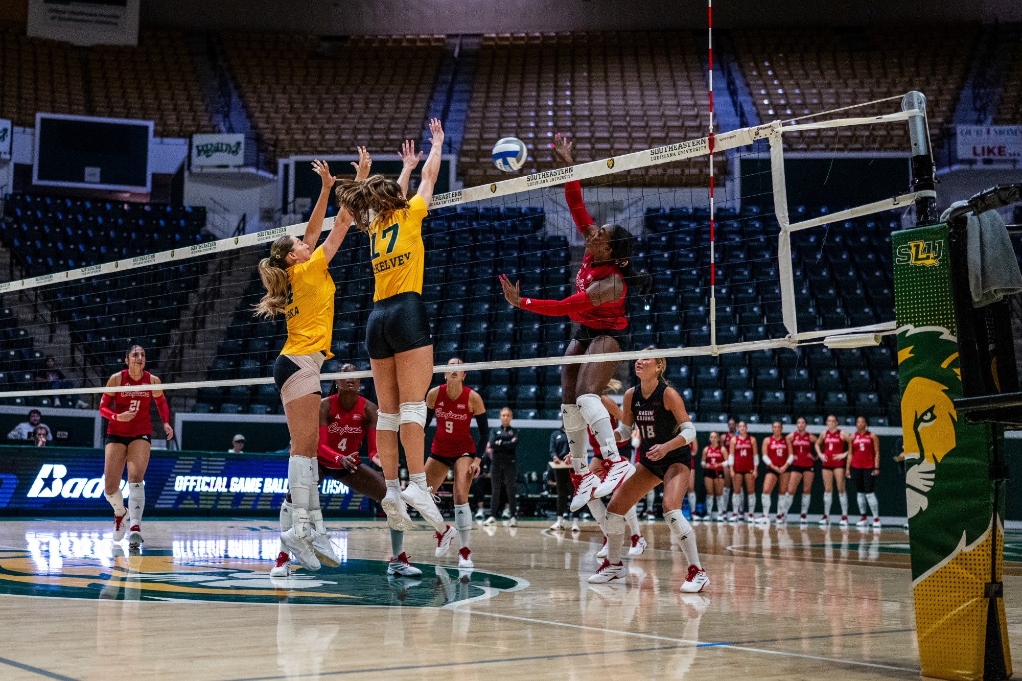 Ainsley Driska and Kyra McKelvey go for a block in the University Center