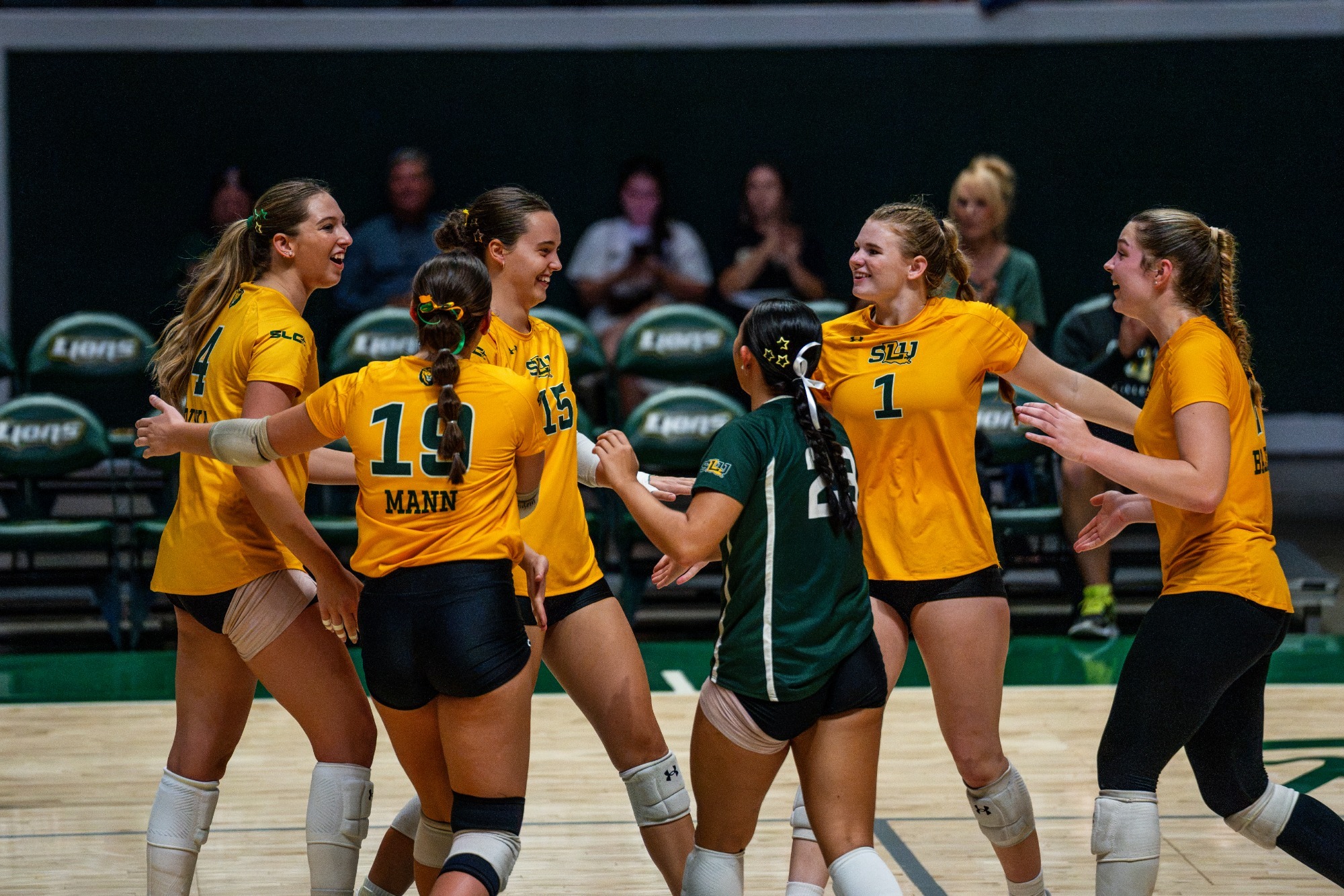 The Lions celebrate in the University Center