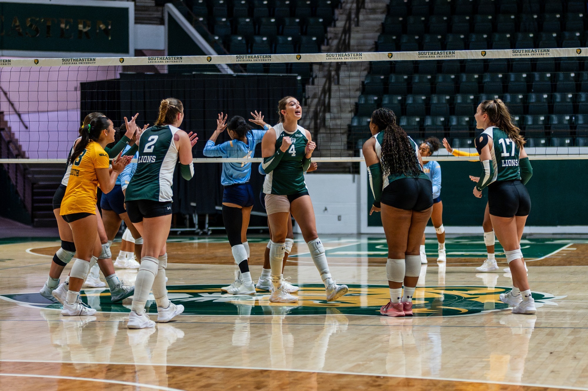 Ainsley Driska celebrates after a point in the University Center