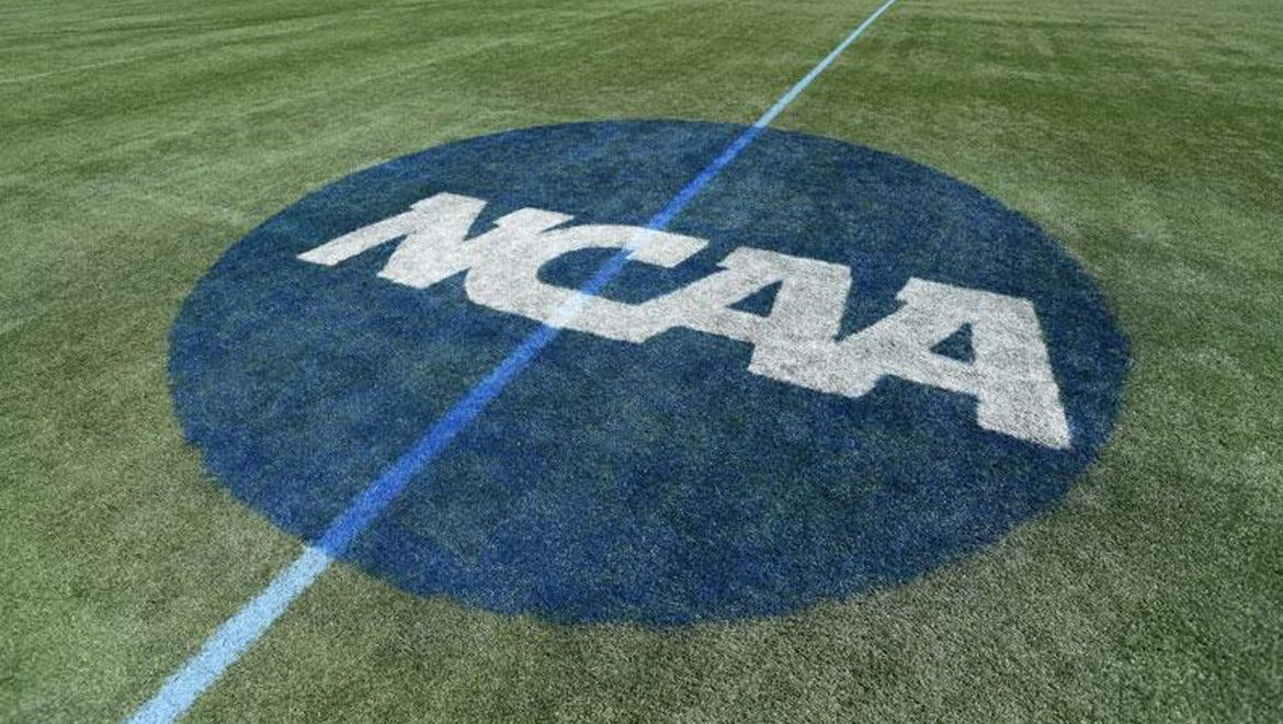 ncaa logo on soccer field