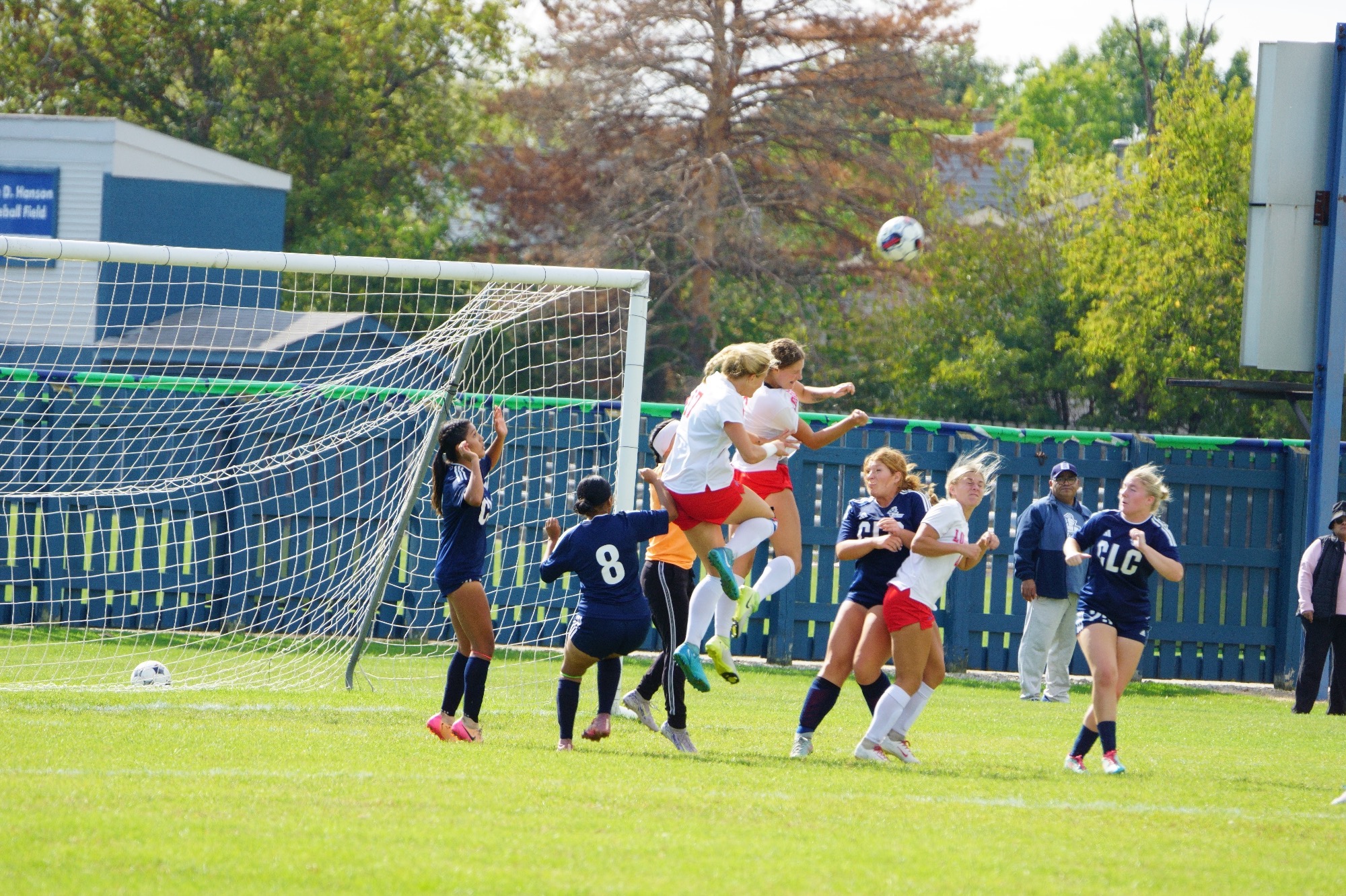 Girls playing soccer.