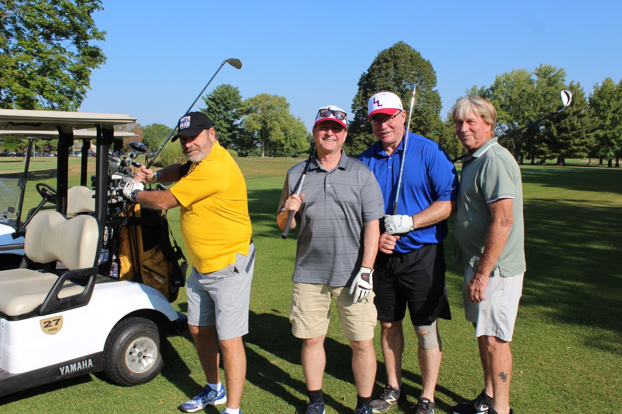 2024 Golf Outing Golfers standing for a group picture