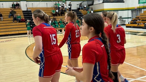 LLCC women's basketball team walking.