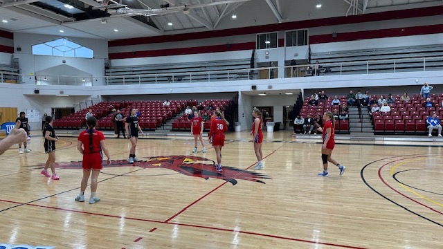 LLCC women's basketball team getting ready to play basketball.