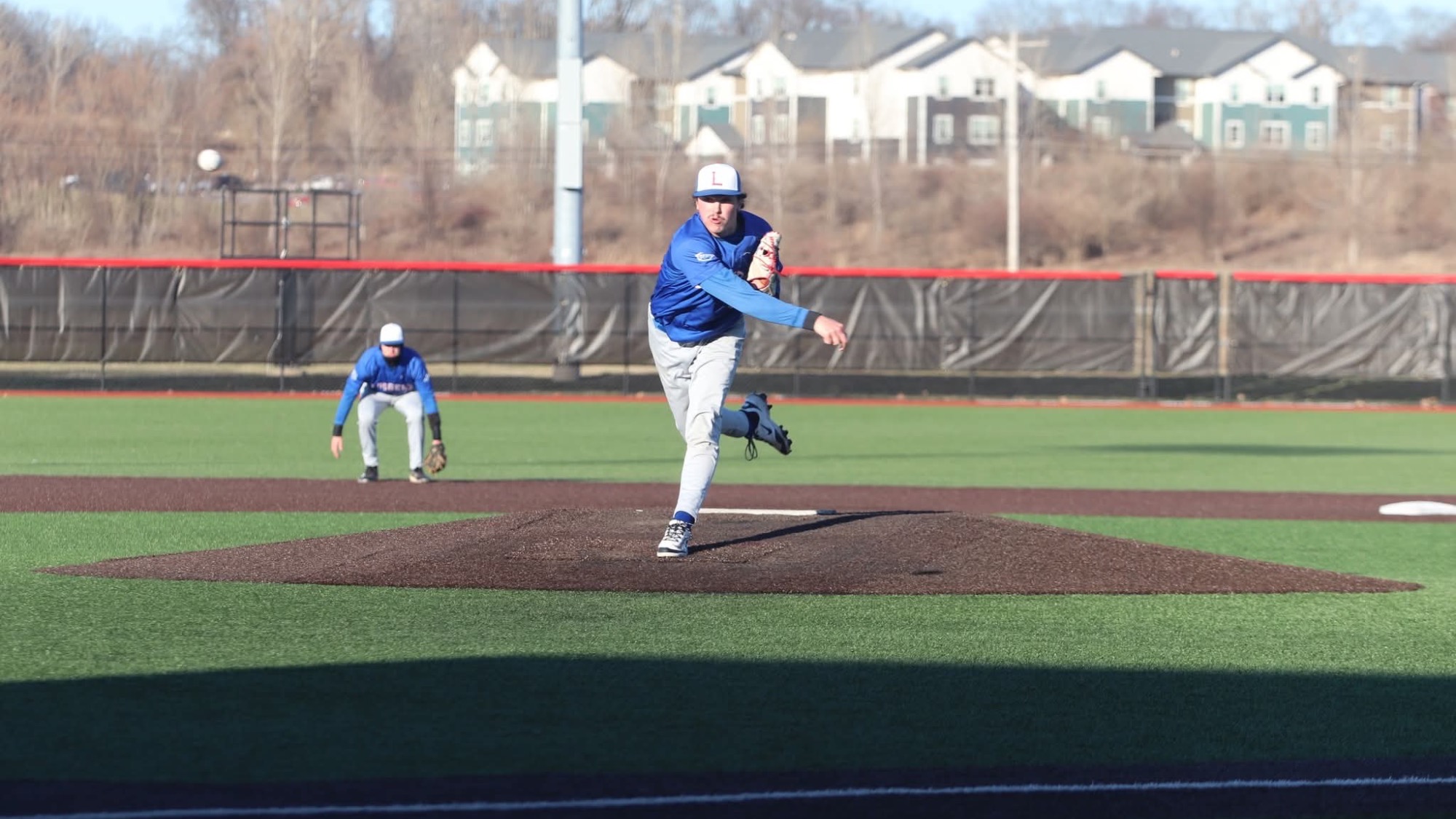 LLCC pitcher throwing a ball.