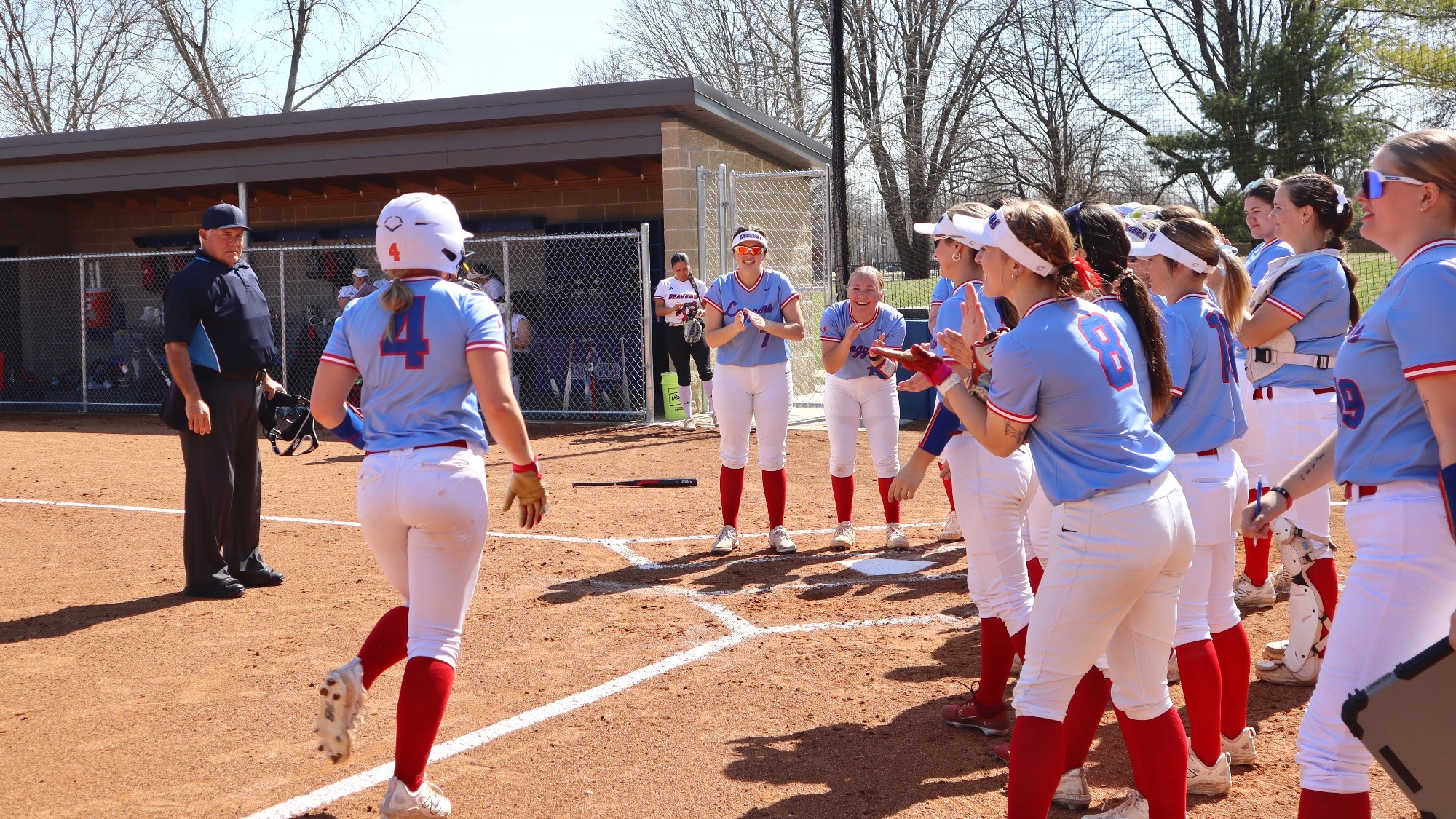 LLCC softball team cheering.